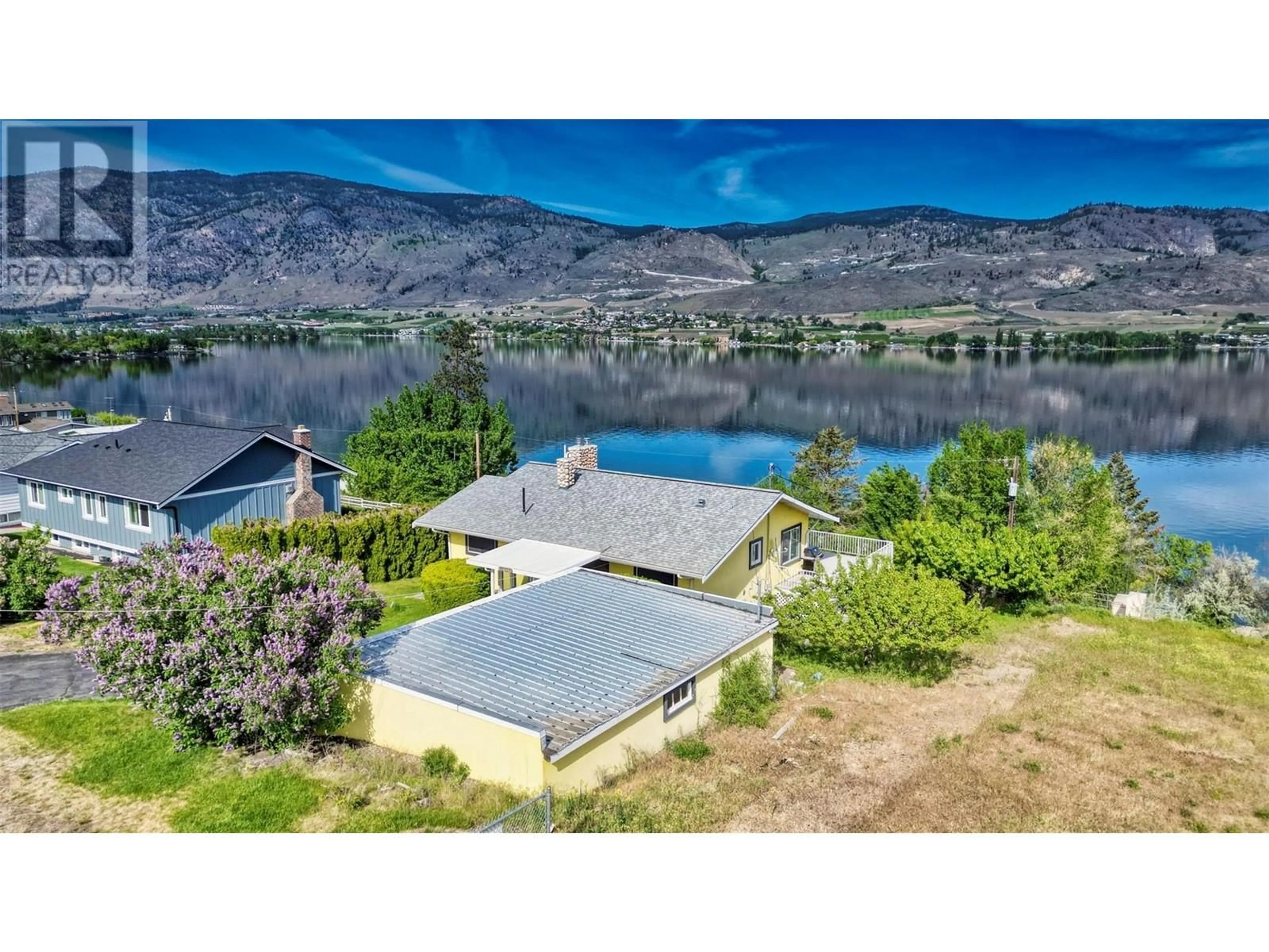 A pic from outside/outdoor area/front of a property/back of a property/a pic from drone, water/lake/river/ocean view for 811 91ST STREET, Osoyoos British Columbia V0H1V1