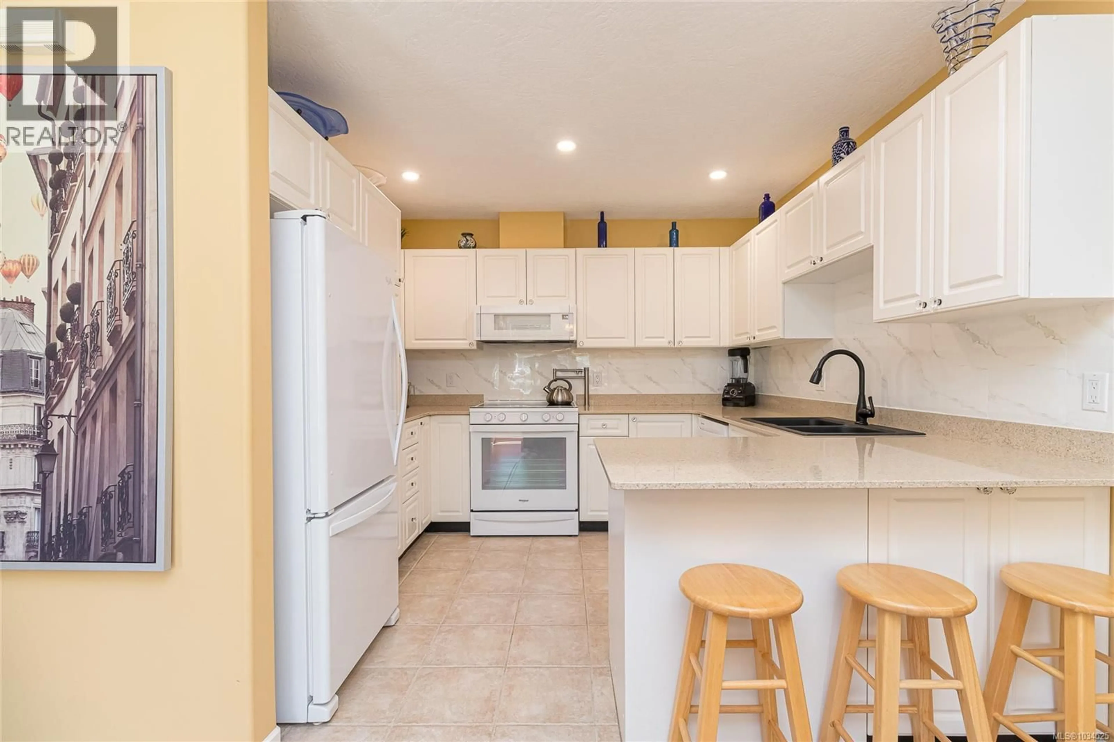 Standard kitchen, ceramic/tile floor for 9 - 4619 ELK LAKE DRIVE, Saanich British Columbia V8Z5M2