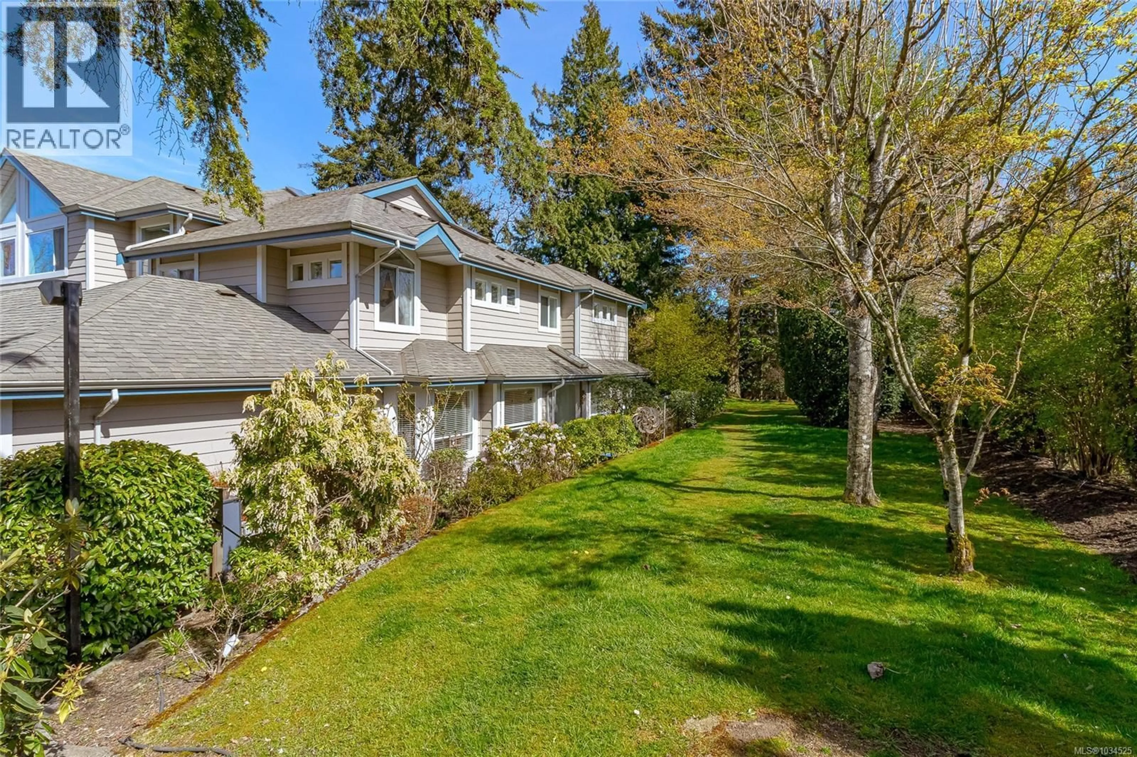 A pic from outside/outdoor area/front of a property/back of a property/a pic from drone, unknown for 9 - 4619 ELK LAKE DRIVE, Saanich British Columbia V8Z5M2
