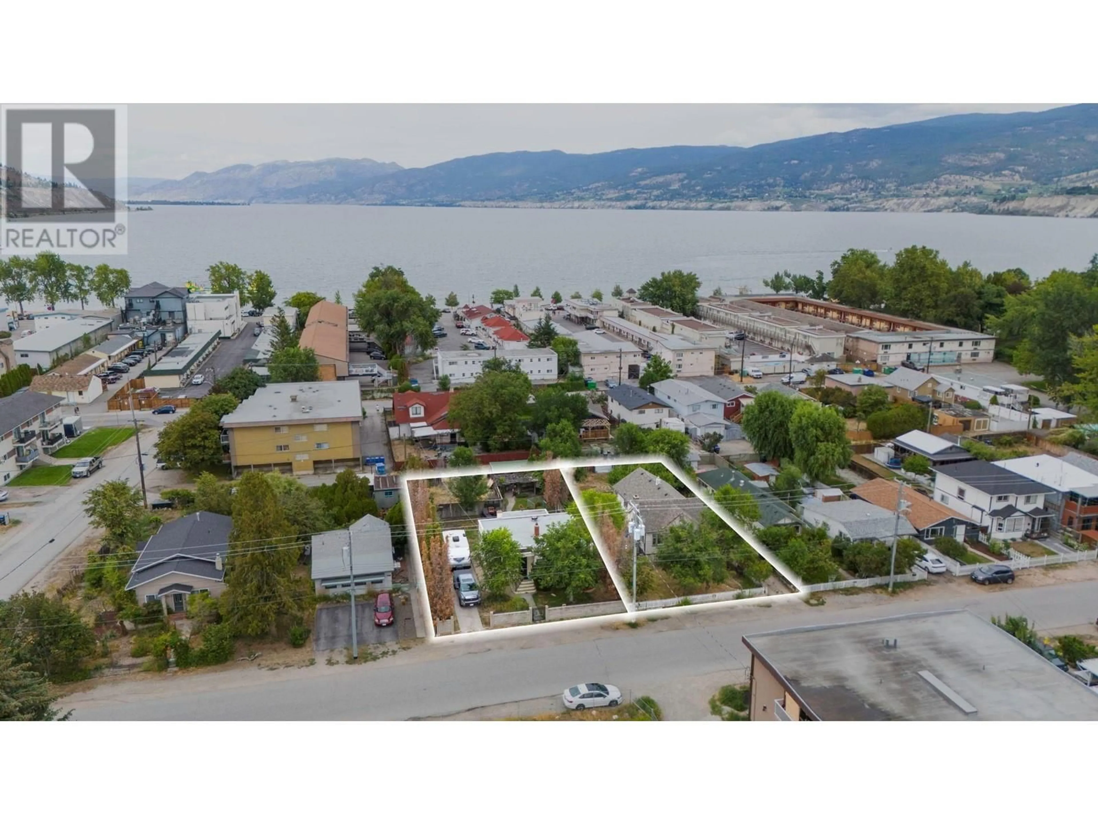A pic from outside/outdoor area/front of a property/back of a property/a pic from drone, water/lake/river/ocean view for 951/963 DYNES AVENUE, Penticton British Columbia V2A1E7