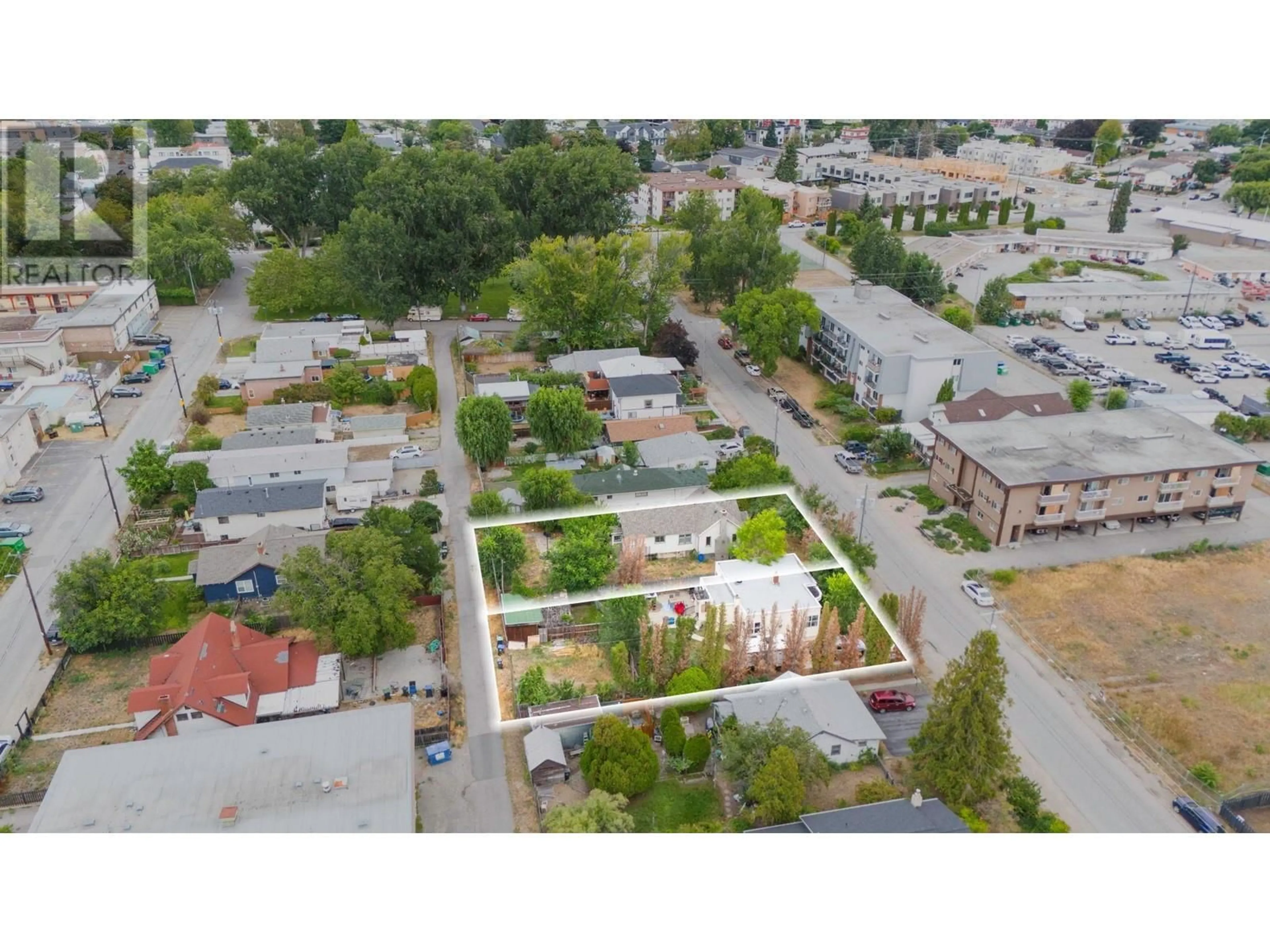 A pic from outside/outdoor area/front of a property/back of a property/a pic from drone, street for 951/963 DYNES AVENUE, Penticton British Columbia V2A1E7