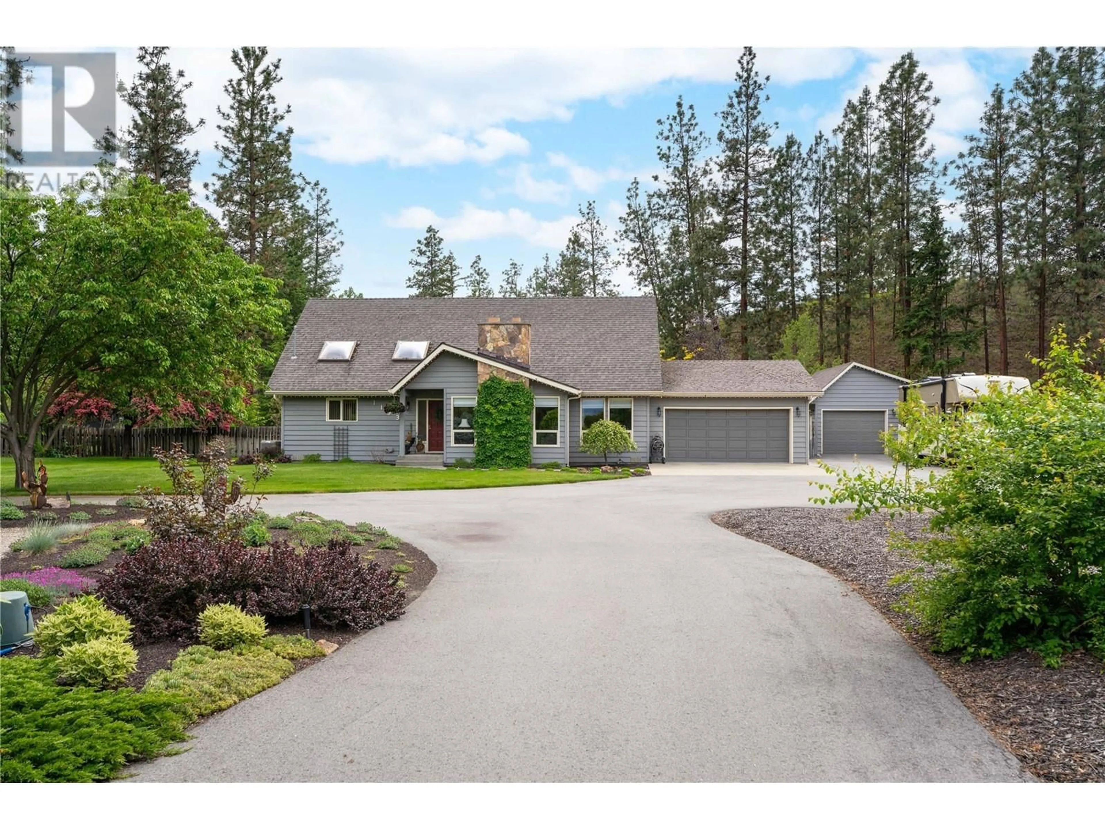 A pic from outside/outdoor area/front of a property/back of a property/a pic from drone, unknown for 1193 MISSION RIDGE ROAD, Kelowna British Columbia V1W3B2