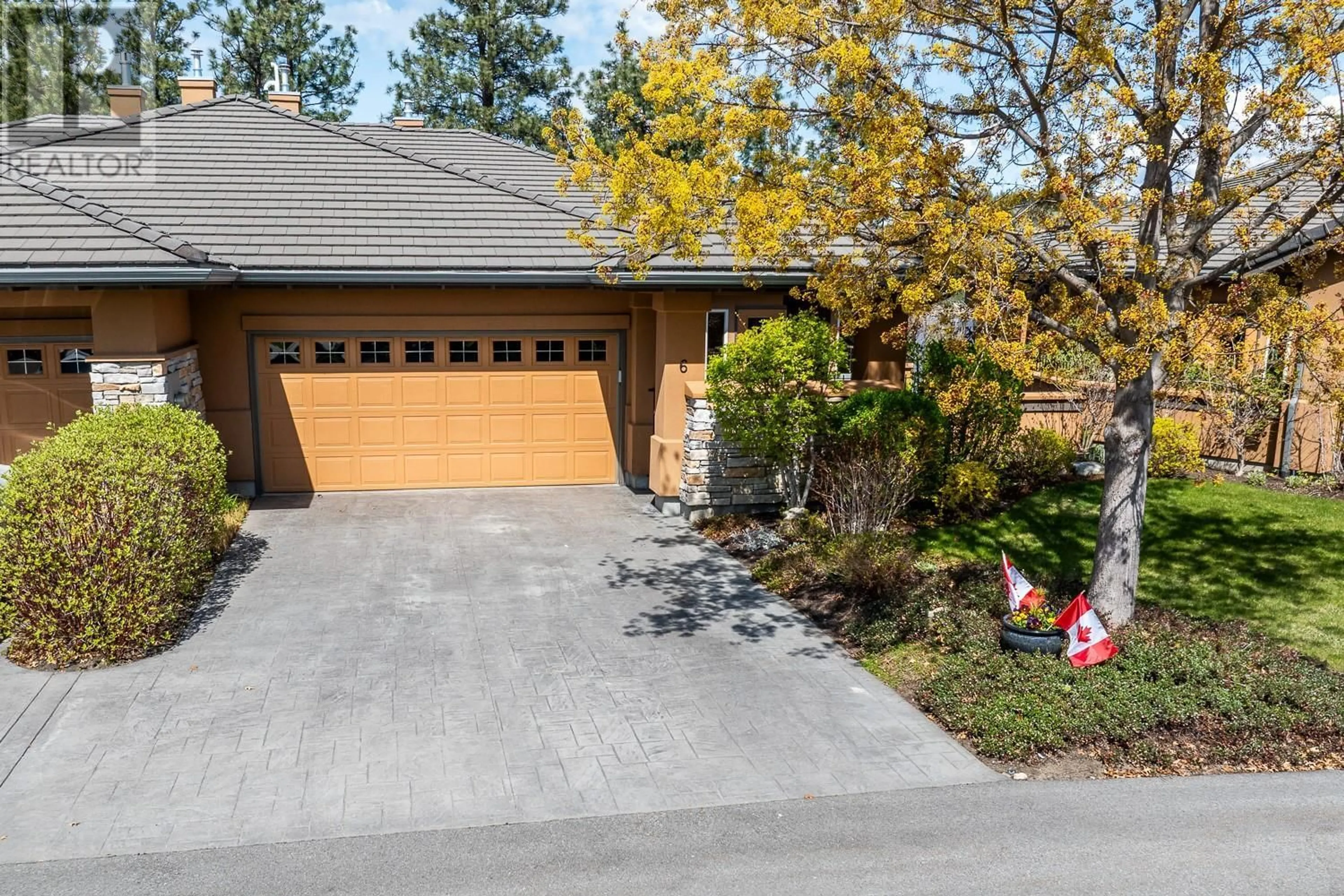 Home with brick exterior material, street for 6 - 4100 GALLAGHERS PARKLAND DRIVE, Kelowna British Columbia V1W3Z8