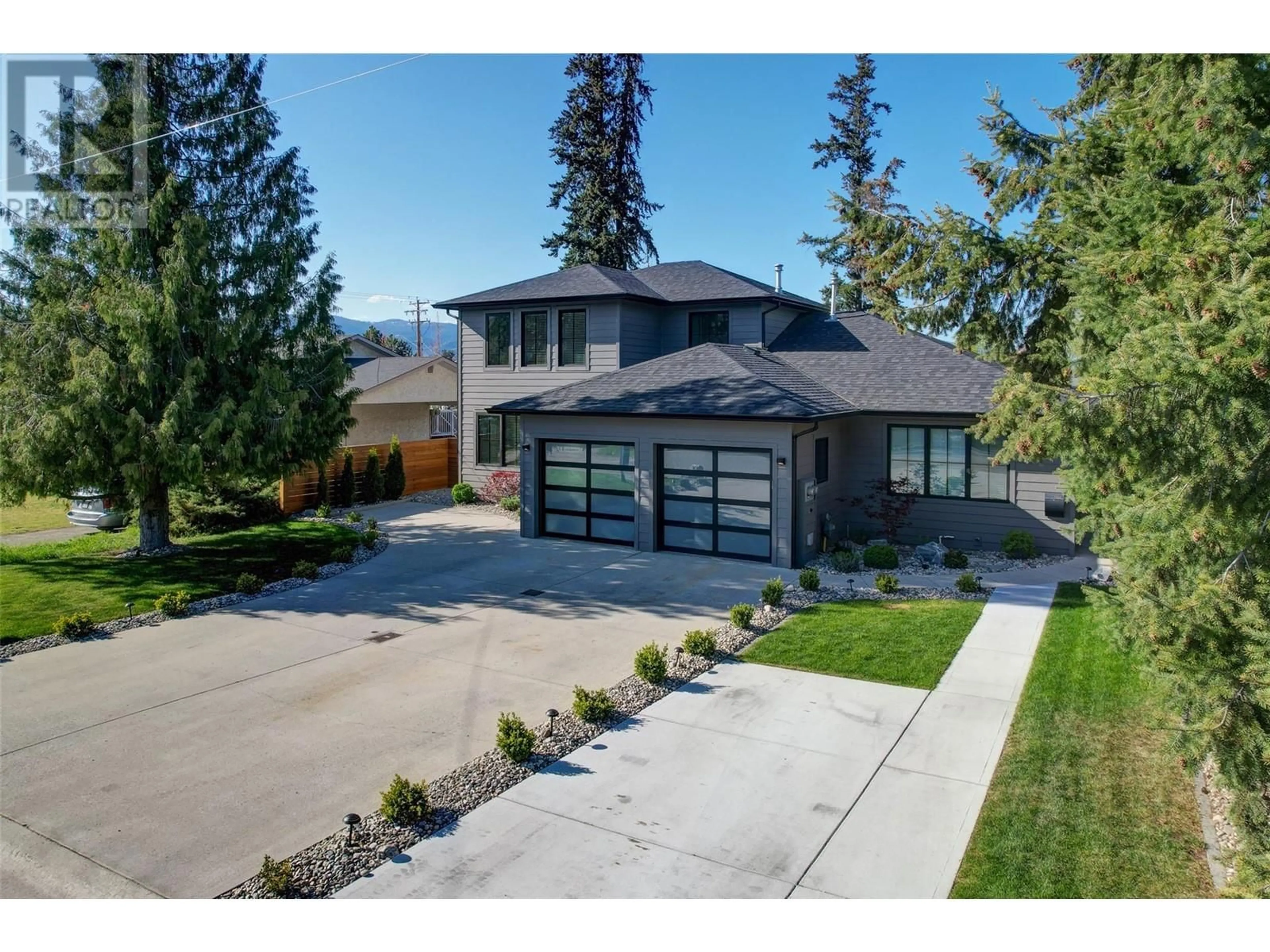 Home with brick exterior material, street for 712 SCHAFER ROAD, Kelowna British Columbia V1W1G1