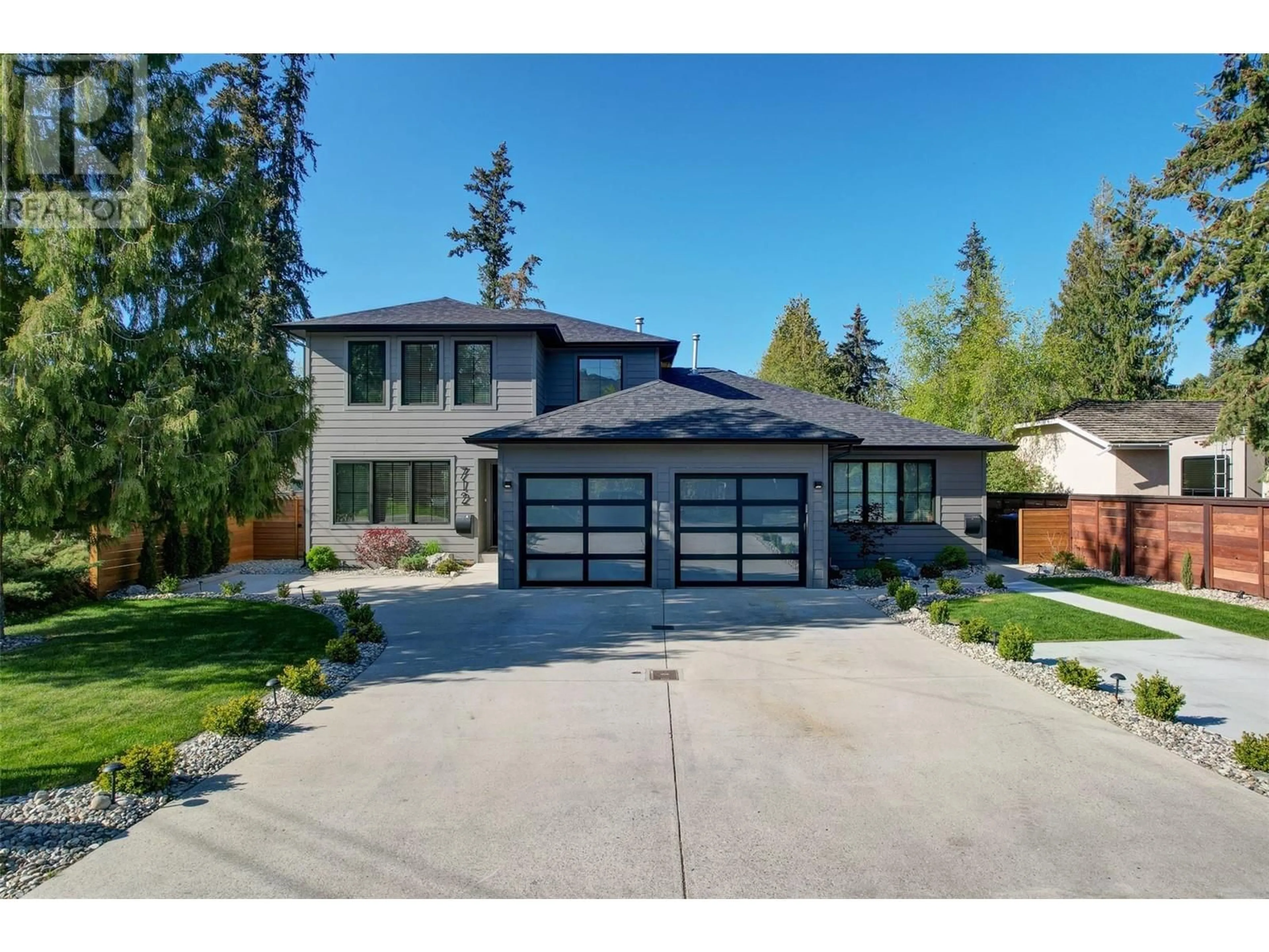 Home with brick exterior material, street for 712 SCHAFER ROAD, Kelowna British Columbia V1W1G1