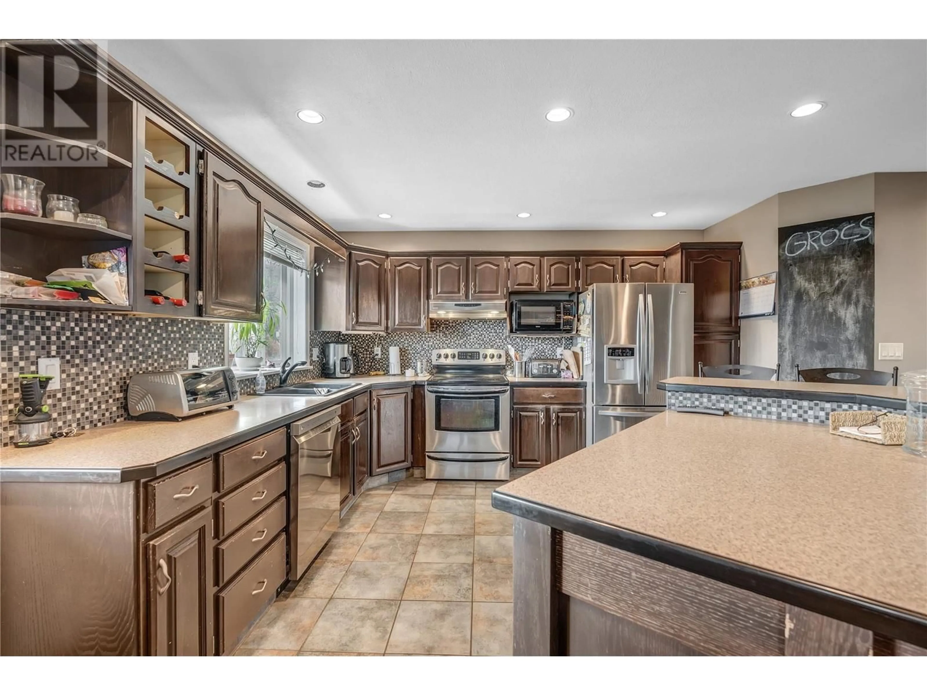 Open concept kitchen, ceramic/tile floor for 6401 HARRISON HEIGHTS, Summerland British Columbia V0H1Z7