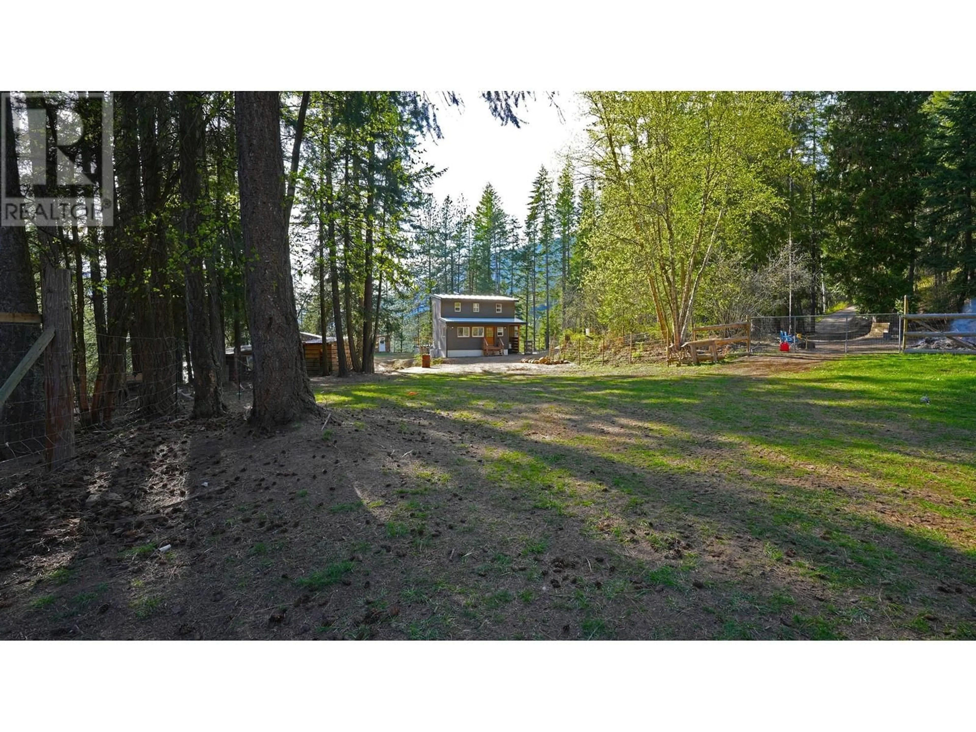 A pic from outside/outdoor area/front of a property/back of a property/a pic from drone, forest/trees view for 3600 BORROW PIT ROAD, Robson British Columbia V1N4V4