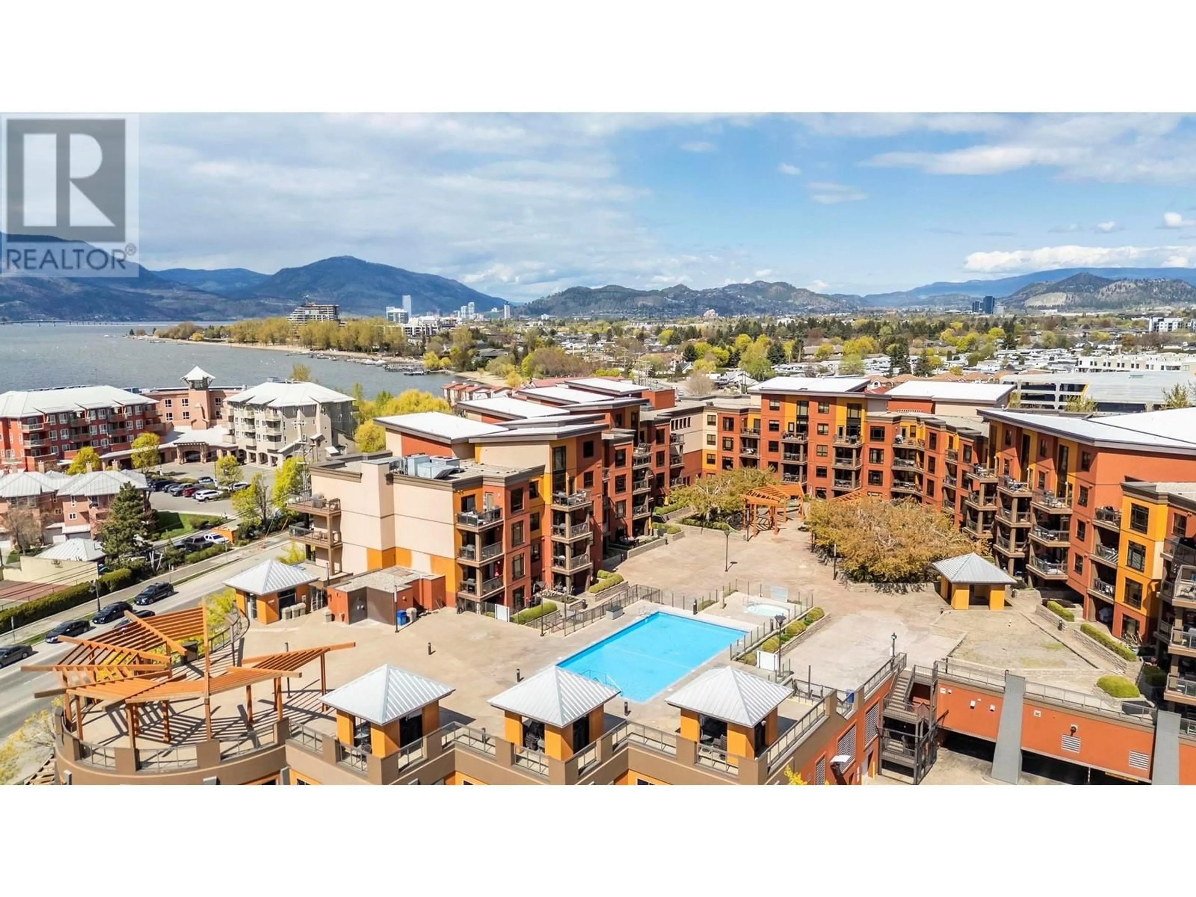 A pic from outside/outdoor area/front of a property/back of a property/a pic from drone, mountain view for 543 - 654 COOK ROAD, Kelowna British Columbia V1W3G7