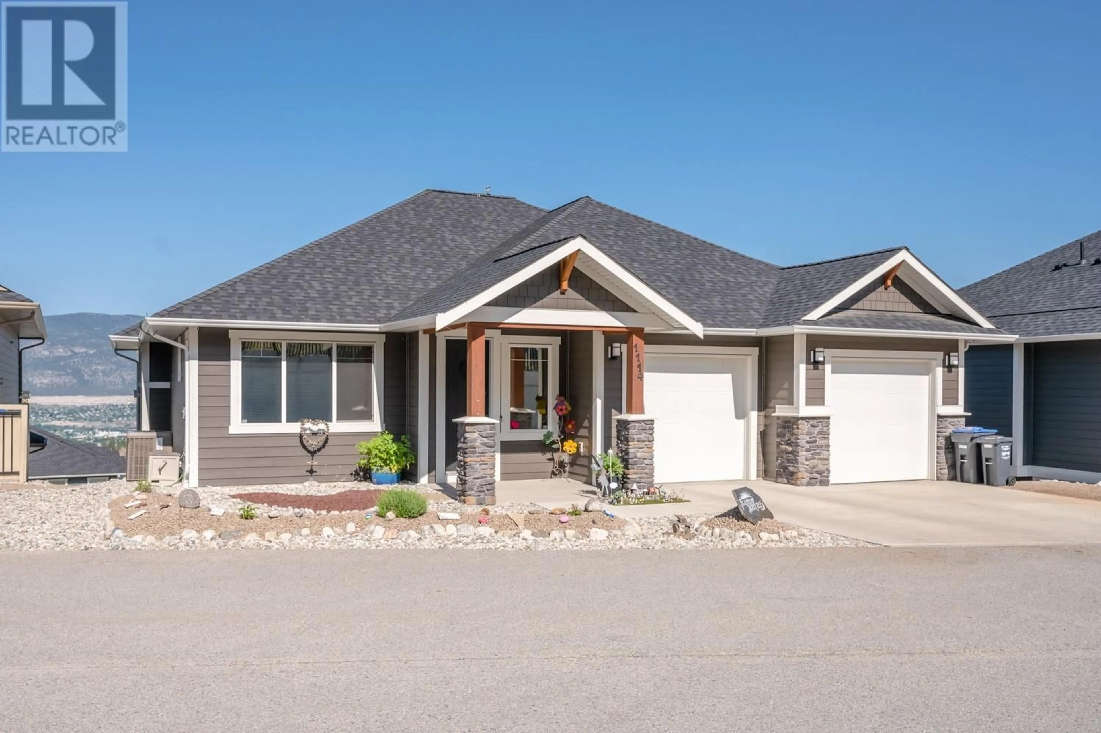 Home with vinyl exterior material, street for 1114 HOLDEN ROAD, Penticton British Columbia V2A0B7