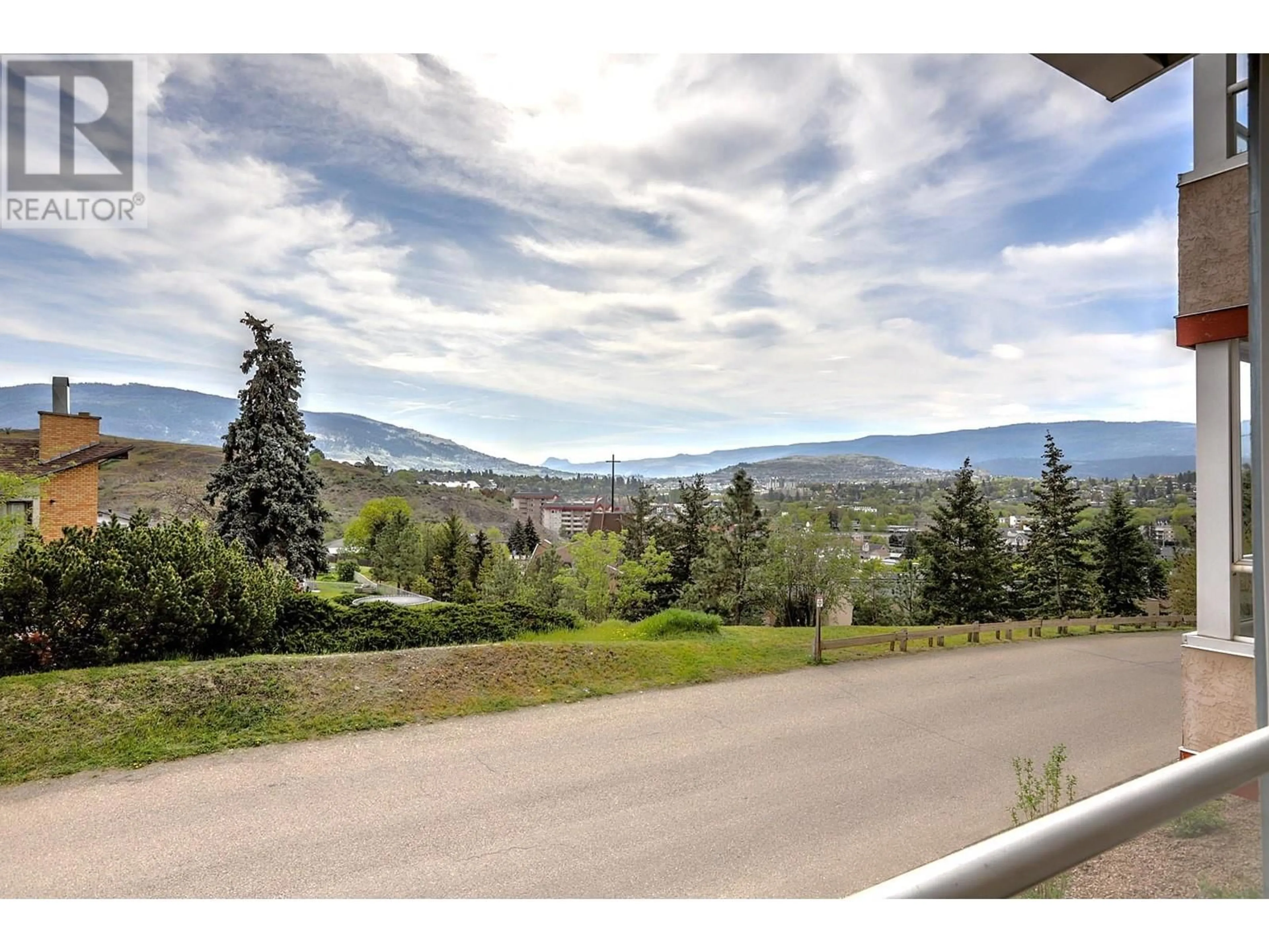 A pic from outside/outdoor area/front of a property/back of a property/a pic from drone, mountain view for 101 - 3808 35 AVENUE, Vernon British Columbia V1T2T9