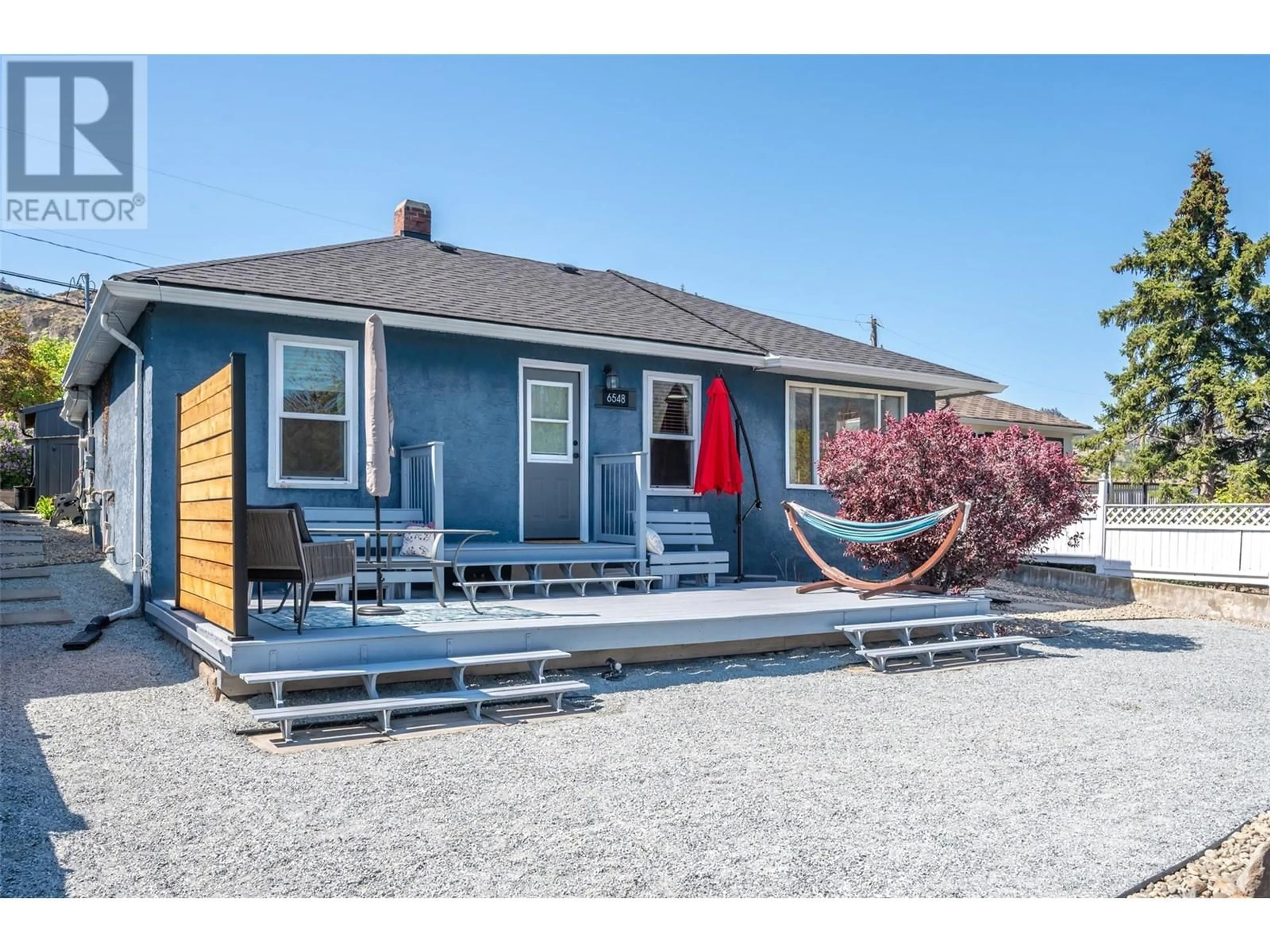Home with vinyl exterior material, street for 6548 MAIN STREET, Oliver British Columbia V0H1T0