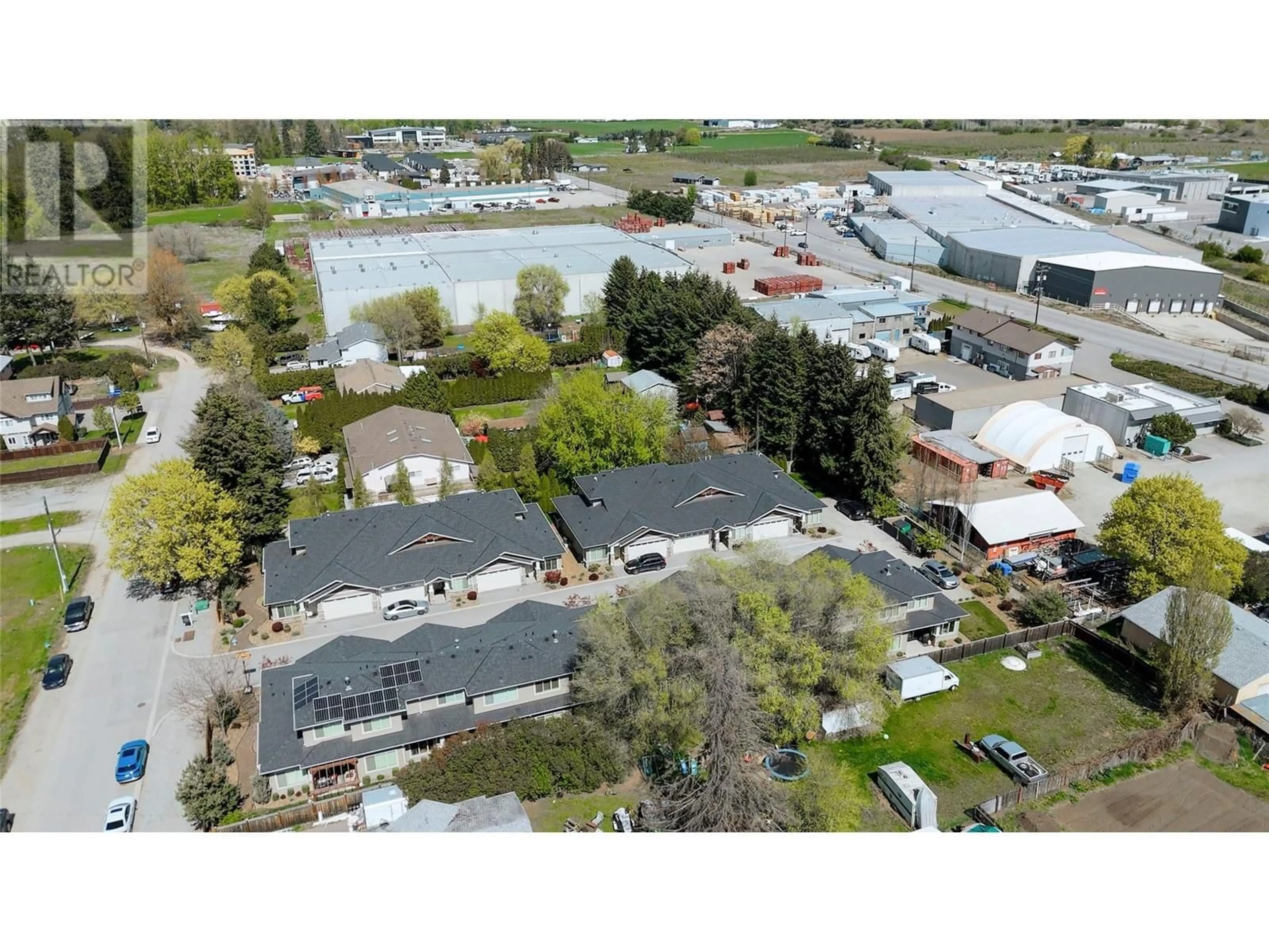 A pic from outside/outdoor area/front of a property/back of a property/a pic from drone, street for 402 - 9563 JENSEN ROAD, Lake Country British Columbia V4V1S6