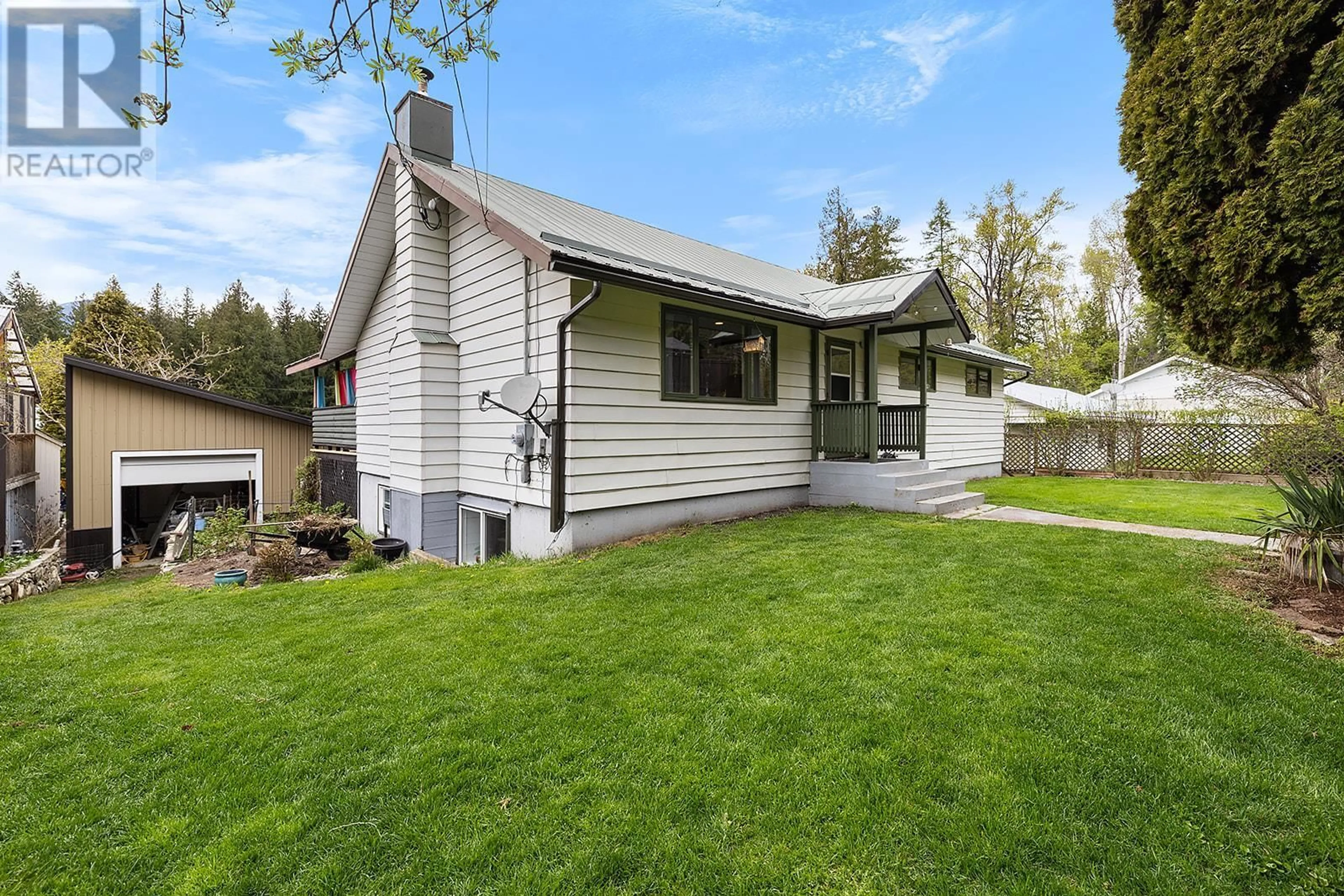 Home with vinyl exterior material, street for 1629 AINSWORTH AVENUE, Riondel British Columbia V0B2B0