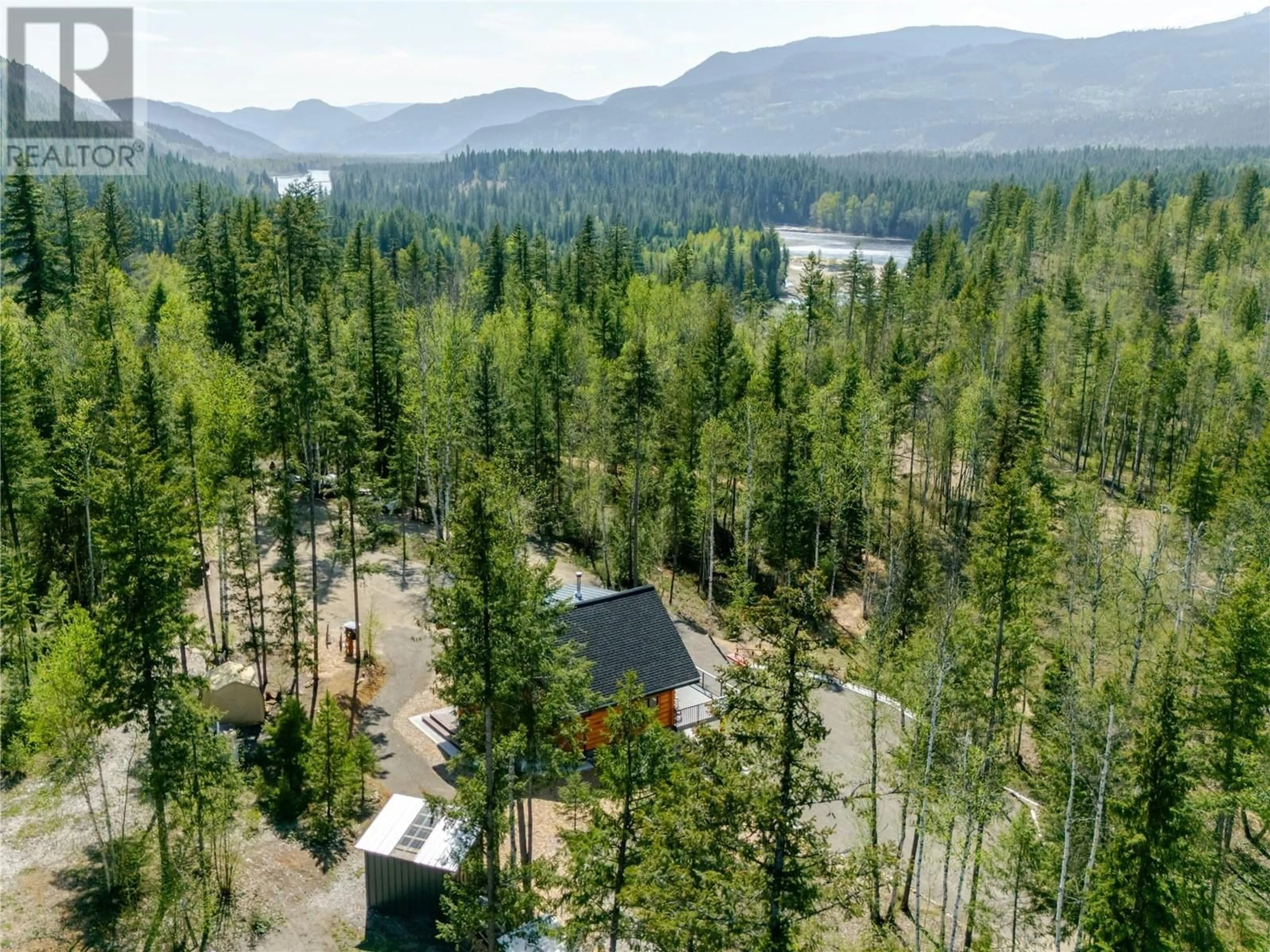 A pic from outside/outdoor area/front of a property/back of a property/a pic from drone, forest/trees view for 63 GLEN EDDY COURT, Clearwater British Columbia V0E1N2