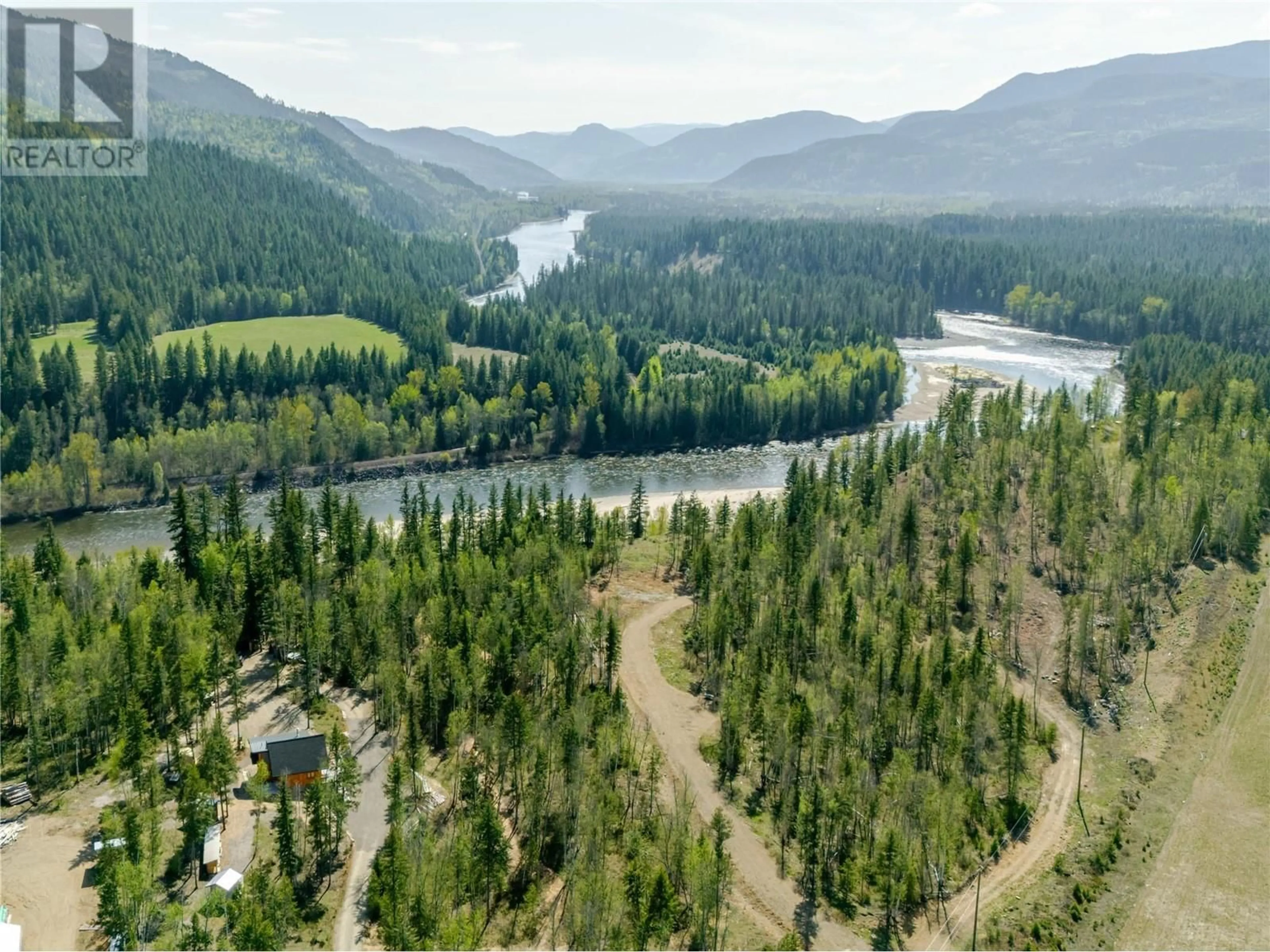 A pic from outside/outdoor area/front of a property/back of a property/a pic from drone, water/lake/river/ocean view for 63 GLEN EDDY COURT, Clearwater British Columbia V0E1N2