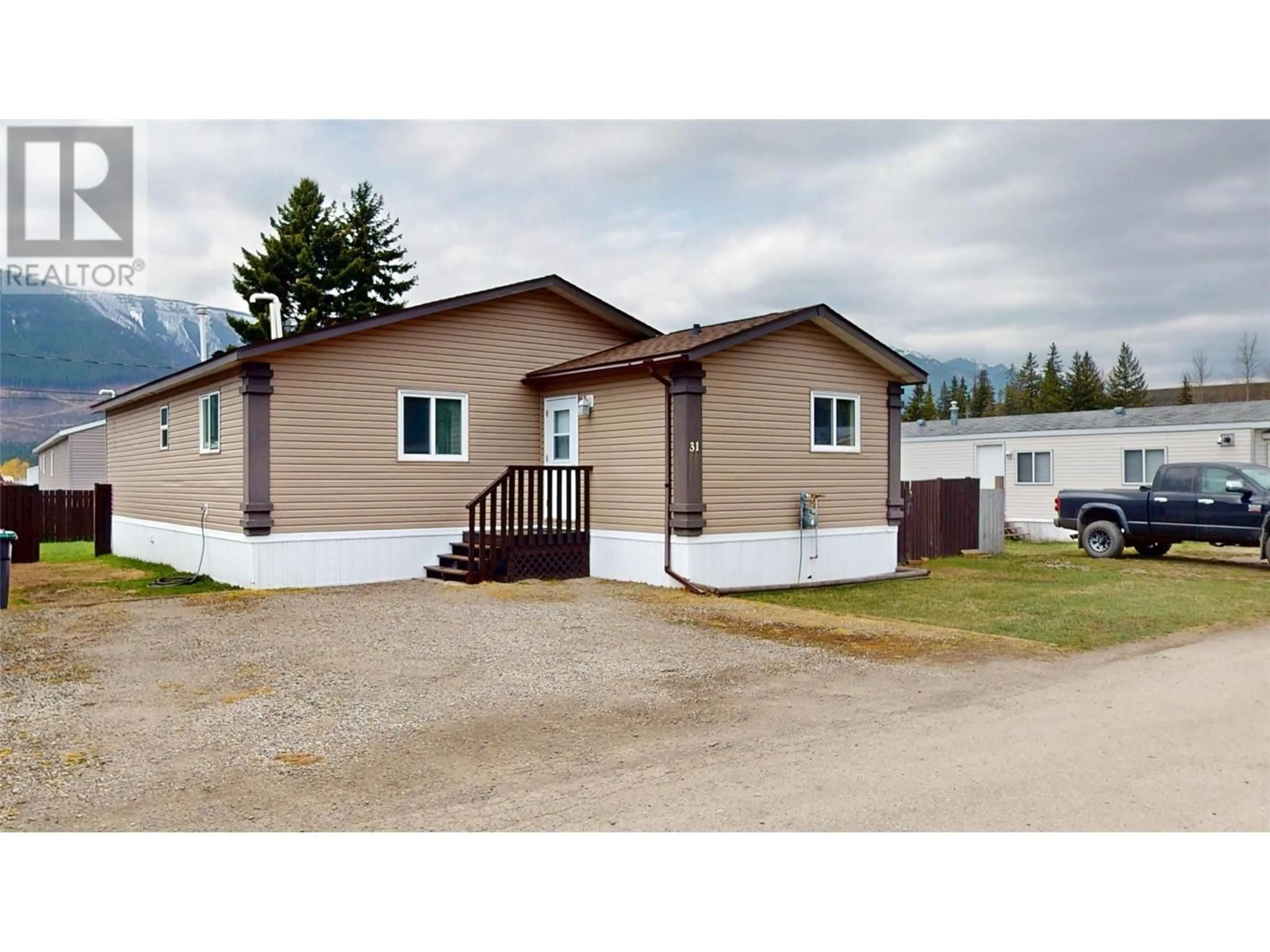 Home with vinyl exterior material, street for 31 - 100 INDUSTRIAL  1 ROAD, Sparwood British Columbia V0B2G1