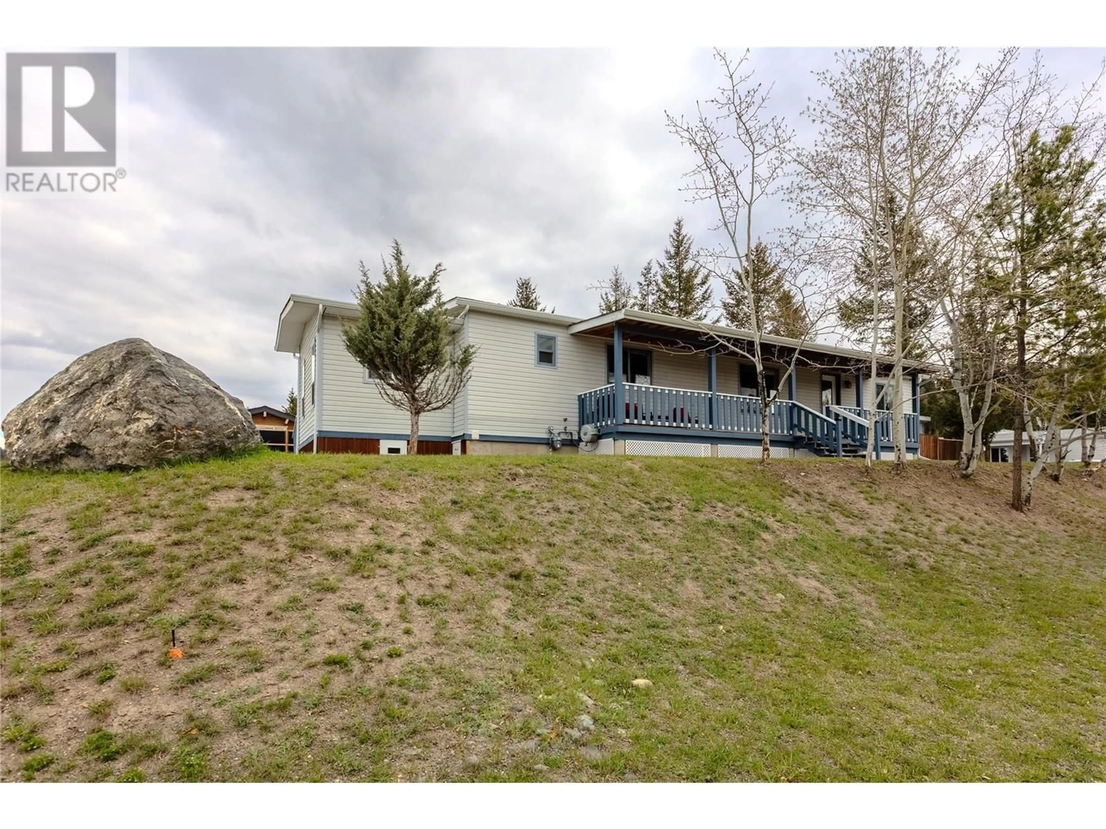 A pic from outside/outdoor area/front of a property/back of a property/a pic from drone, mountain view for 141 TOPAZ CRESCENT, Logan Lake British Columbia V0K1W0