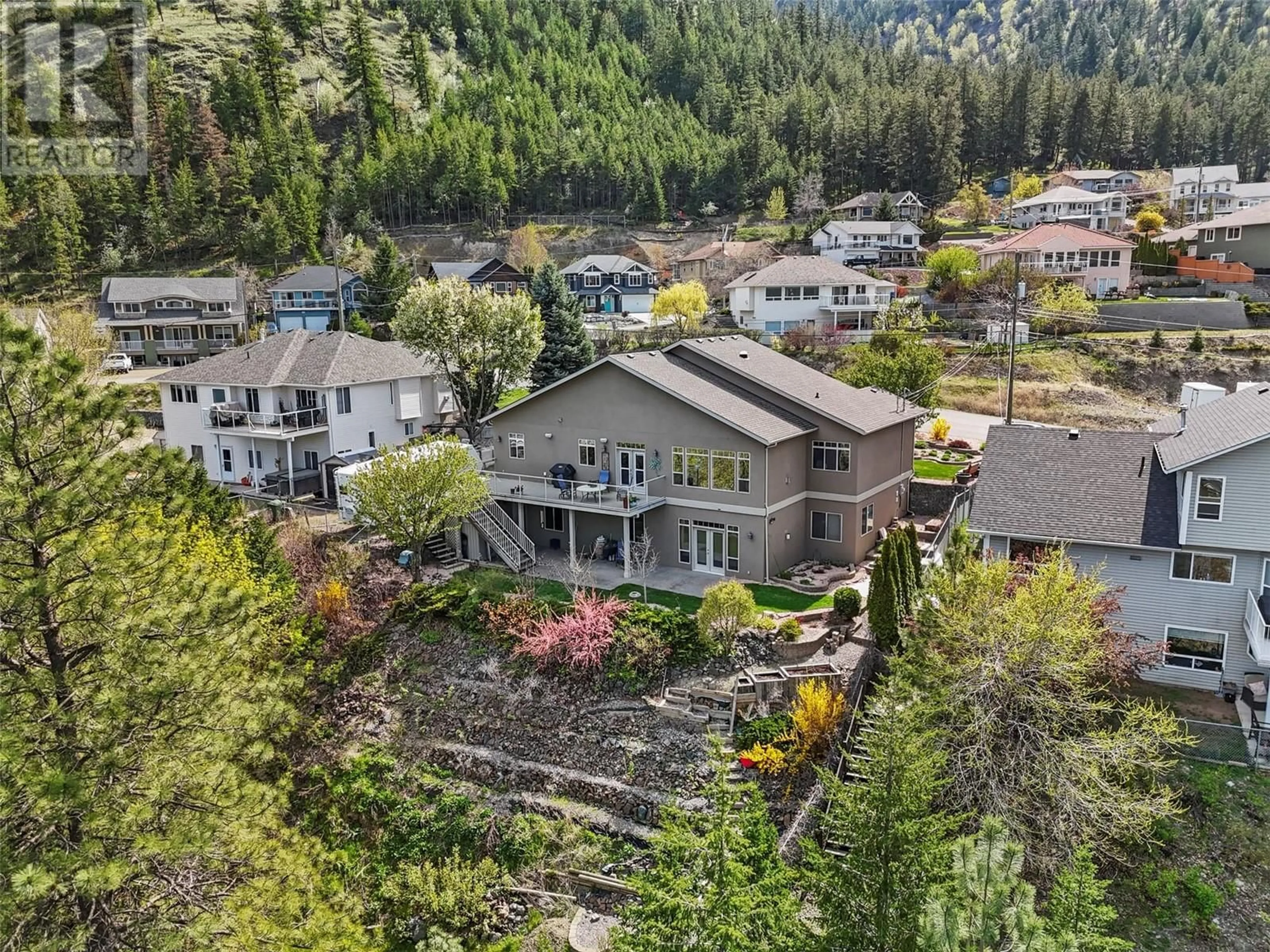 A pic from outside/outdoor area/front of a property/back of a property/a pic from drone, mountain view for 4767 UPLANDS DRIVE, Kamloops British Columbia V2C6S9