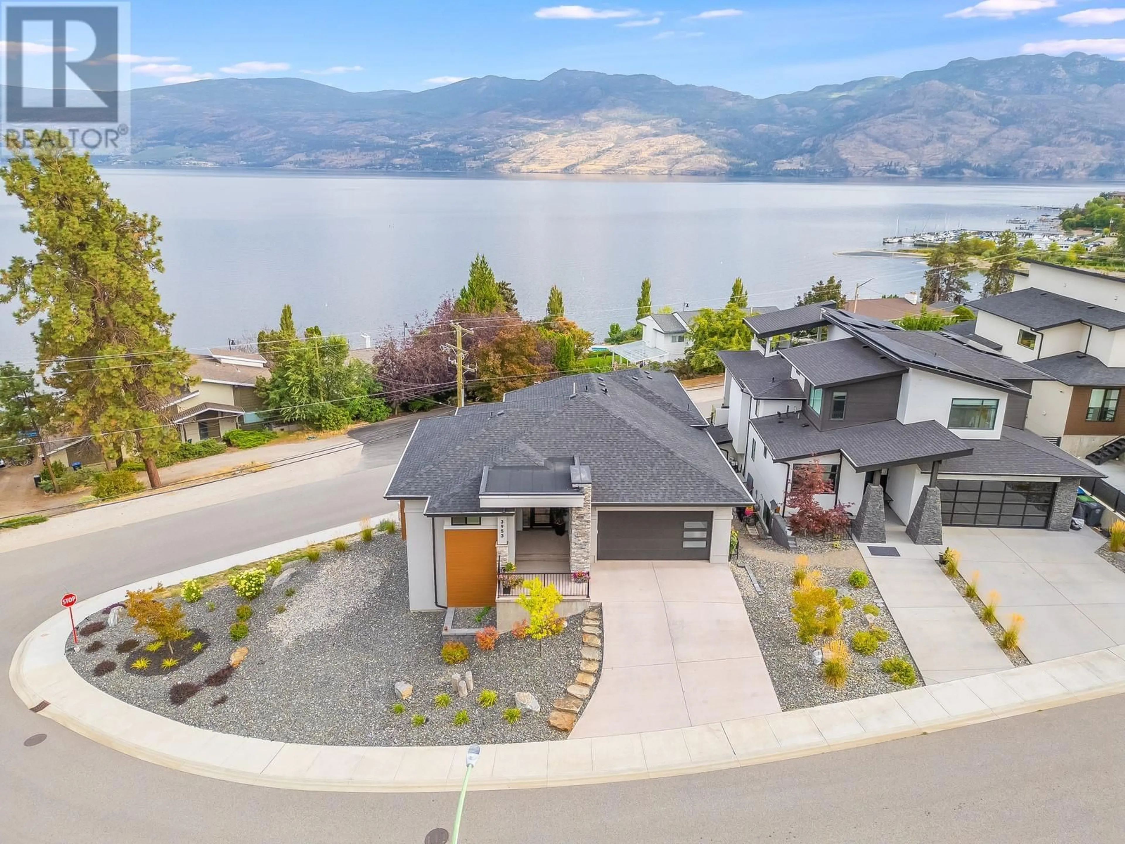 A pic from outside/outdoor area/front of a property/back of a property/a pic from drone, water/lake/river/ocean view for 3953 BEACHVIEW DRIVE, West Kelowna British Columbia V4T2K1