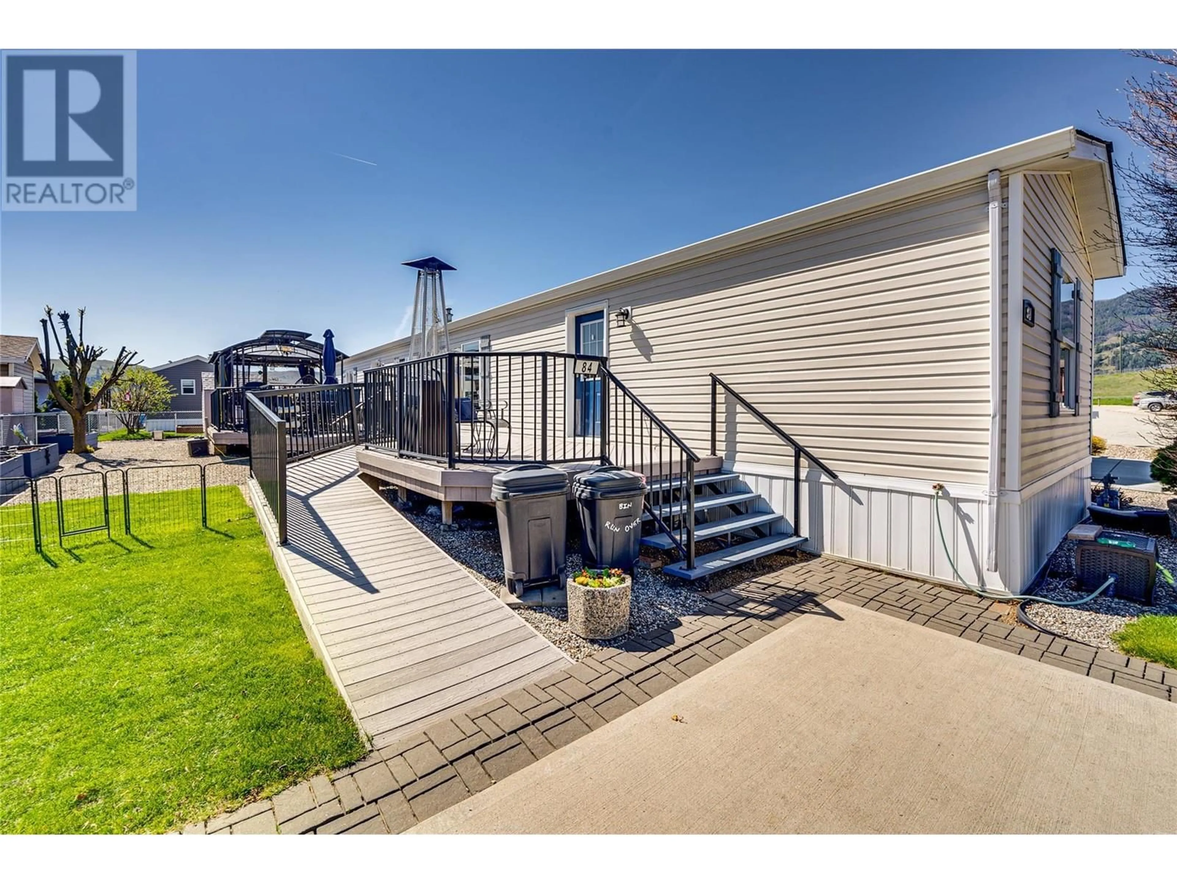 A pic from outside/outdoor area/front of a property/back of a property/a pic from drone, water/lake/river/ocean view for 84 - 12560 WESTSIDE ROAD, Vernon British Columbia V1H1S9