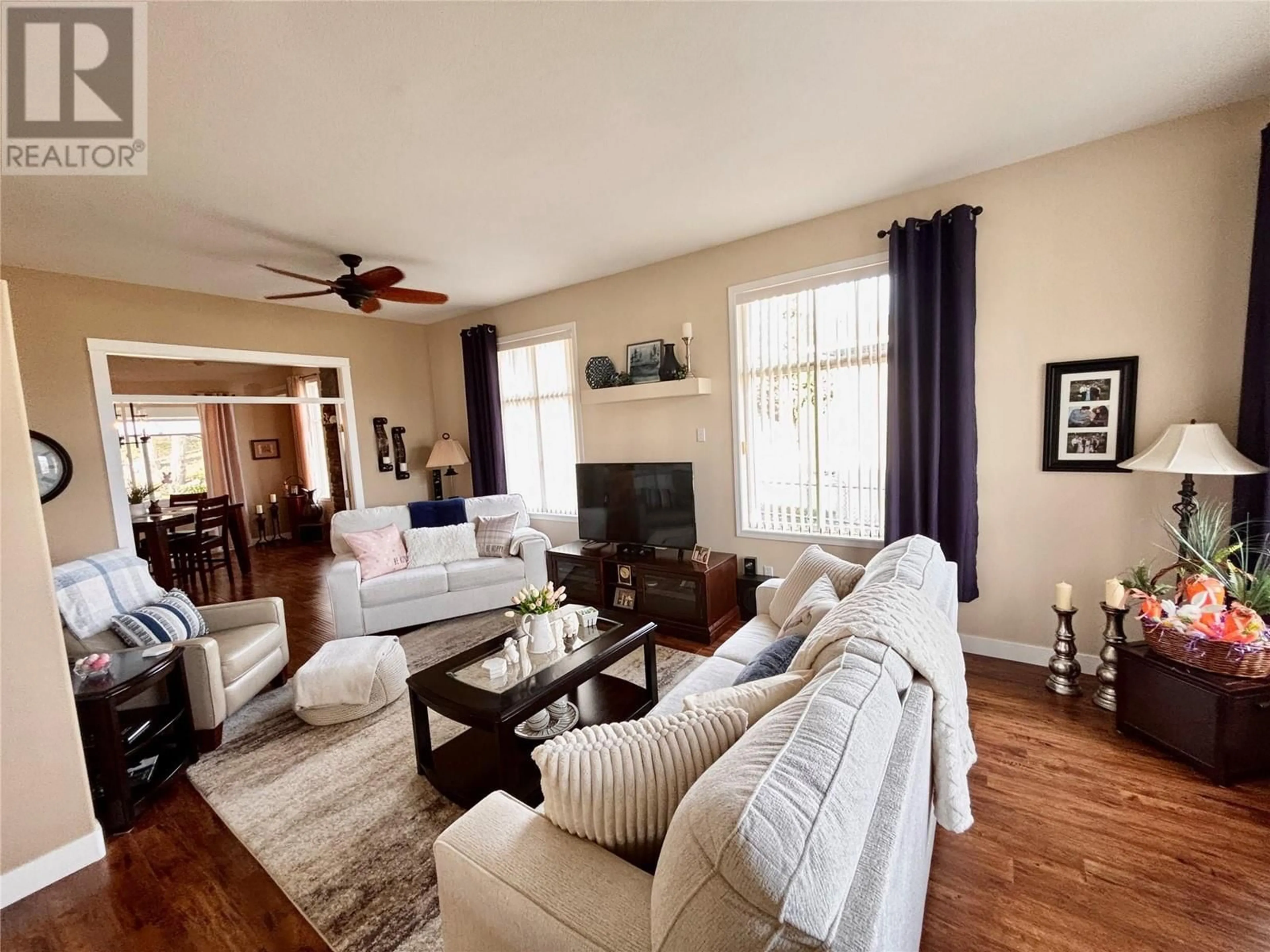 Living room with furniture, wood/laminate floor for 2268 SHANNON HEIGHTS PLACE, West Kelowna British Columbia V4T2V2