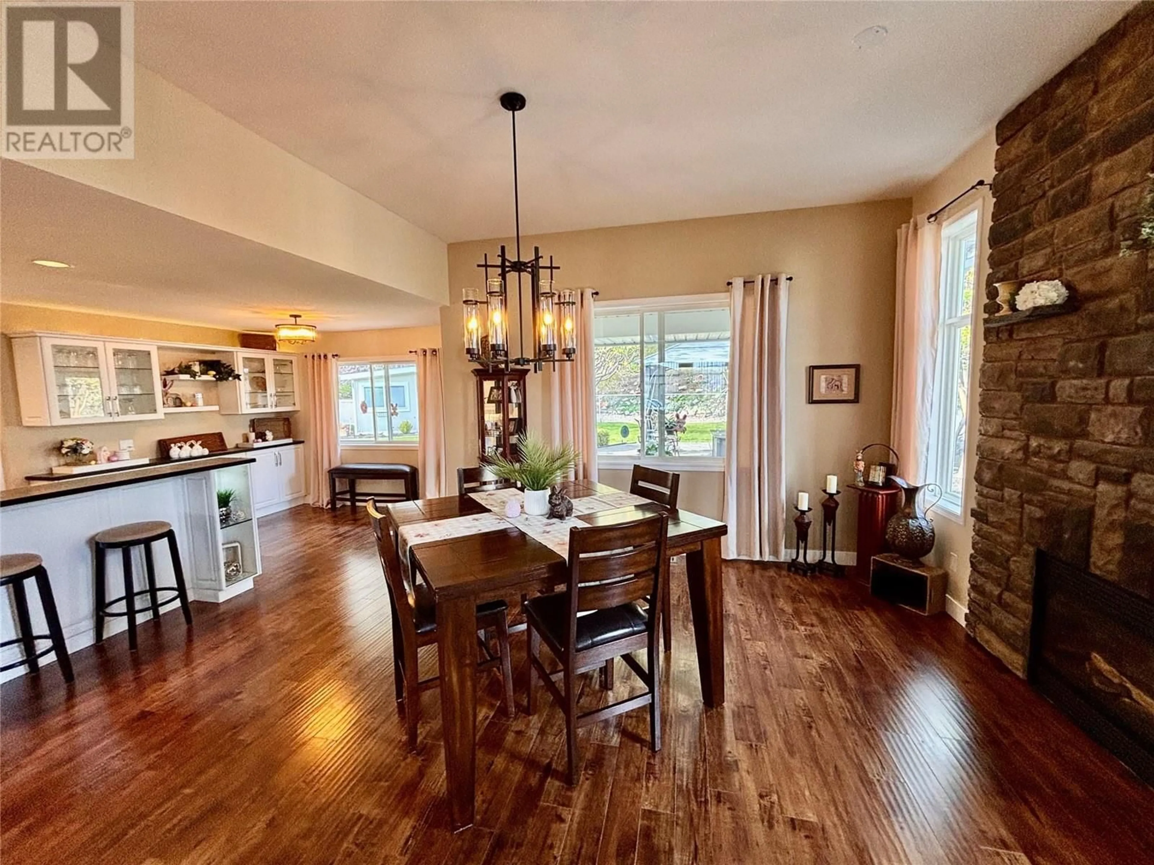 Dining room, wood/laminate floor for 2268 SHANNON HEIGHTS PLACE, West Kelowna British Columbia V4T2V2
