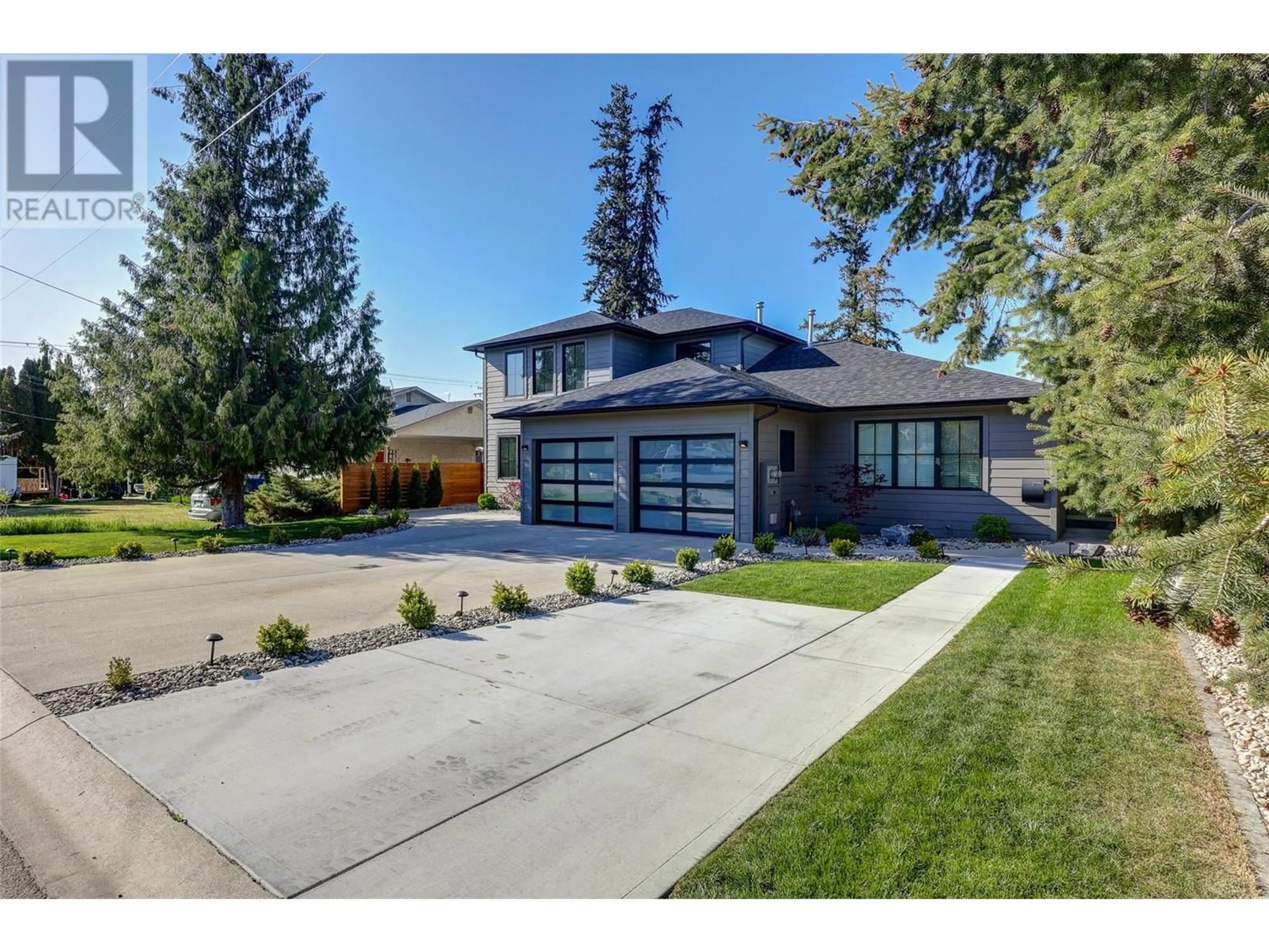 Home with brick exterior material, street for 712 SCHAFER ROAD, Kelowna British Columbia V1W1G1
