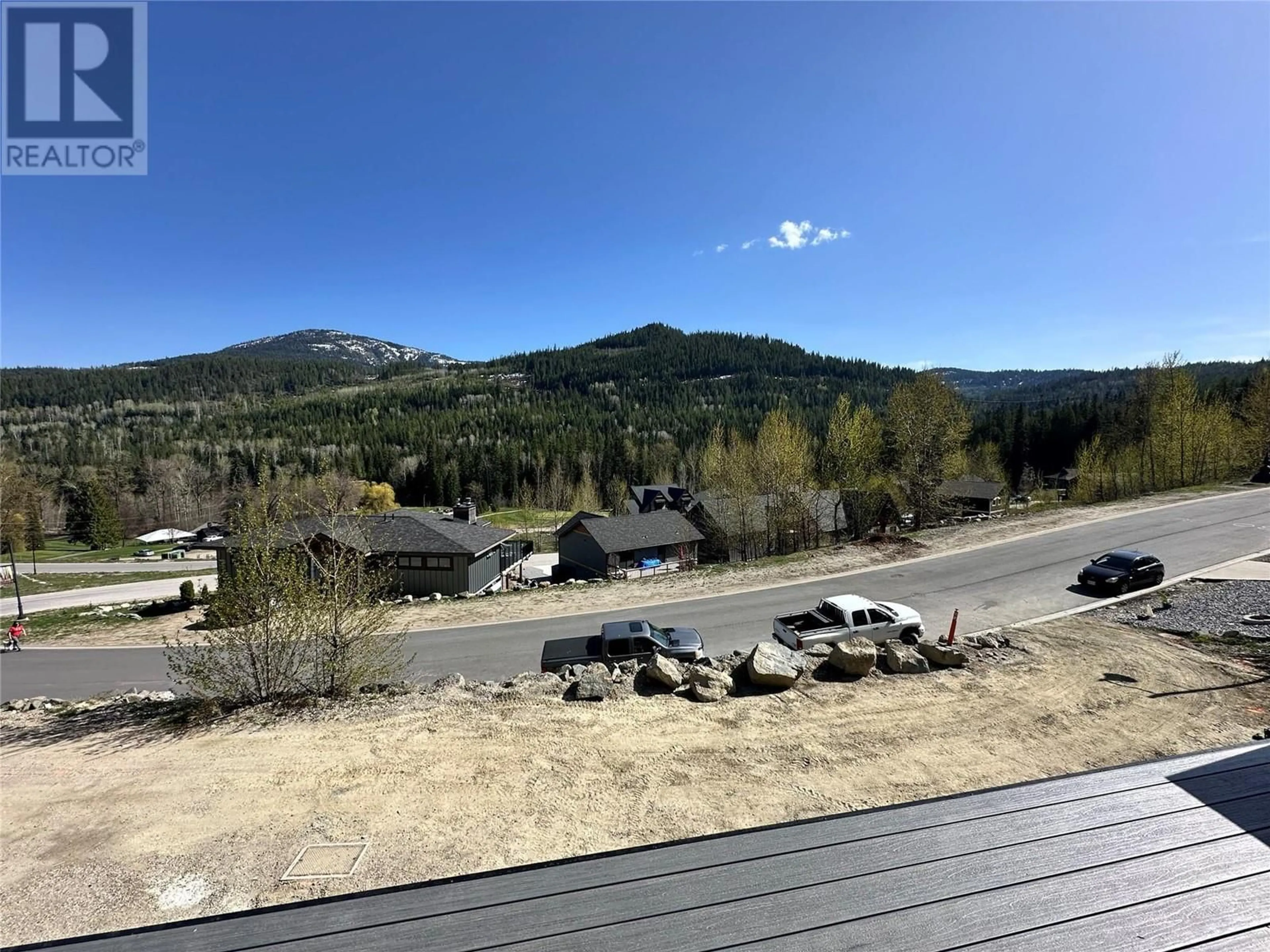 A pic from outside/outdoor area/front of a property/back of a property/a pic from drone, mountain view for 932-3 REDSTONE DRIVE, Rossland British Columbia V0G1Y0