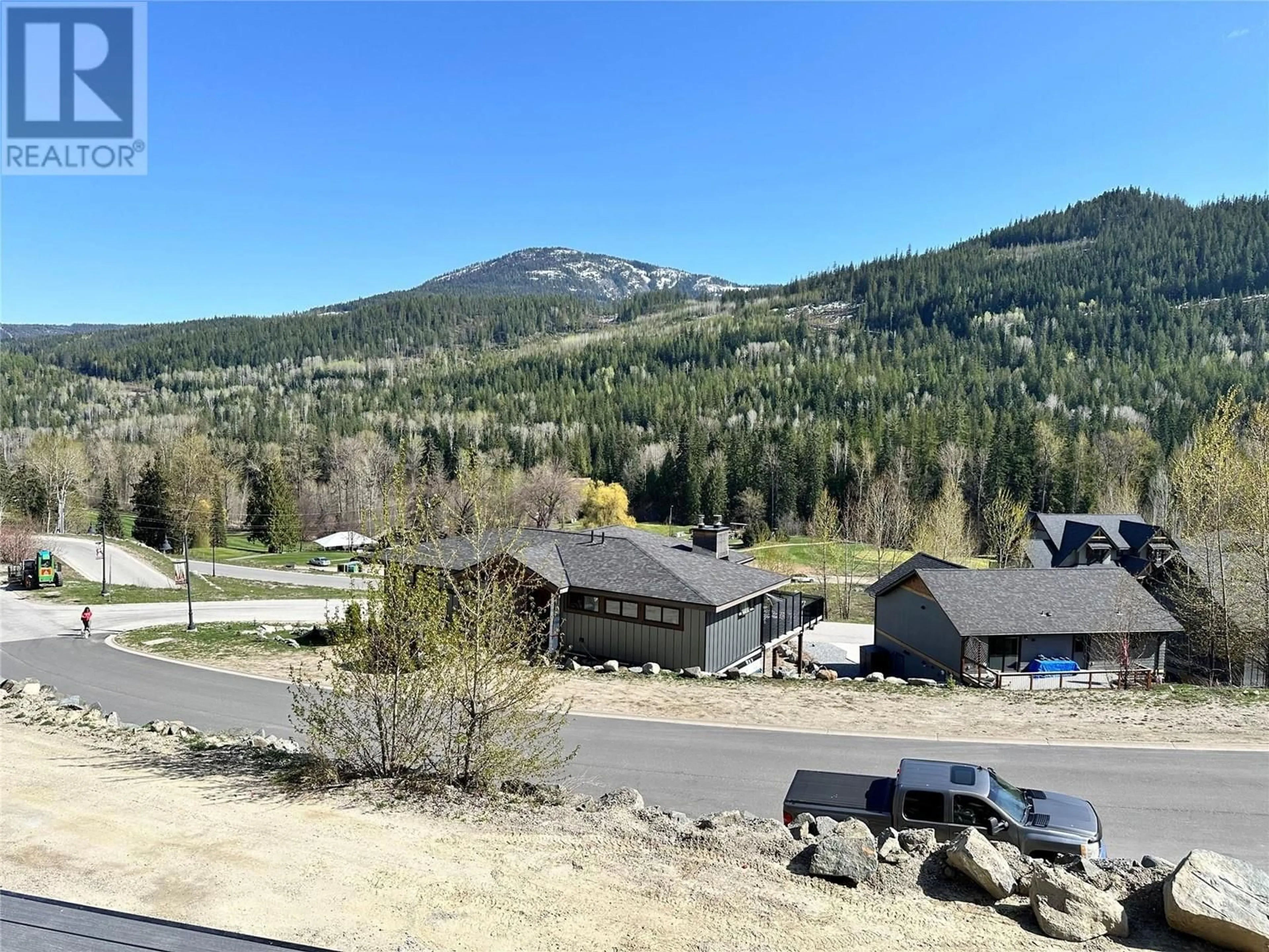A pic from outside/outdoor area/front of a property/back of a property/a pic from drone, mountain view for 932-3 REDSTONE DRIVE, Rossland British Columbia V0G1Y0