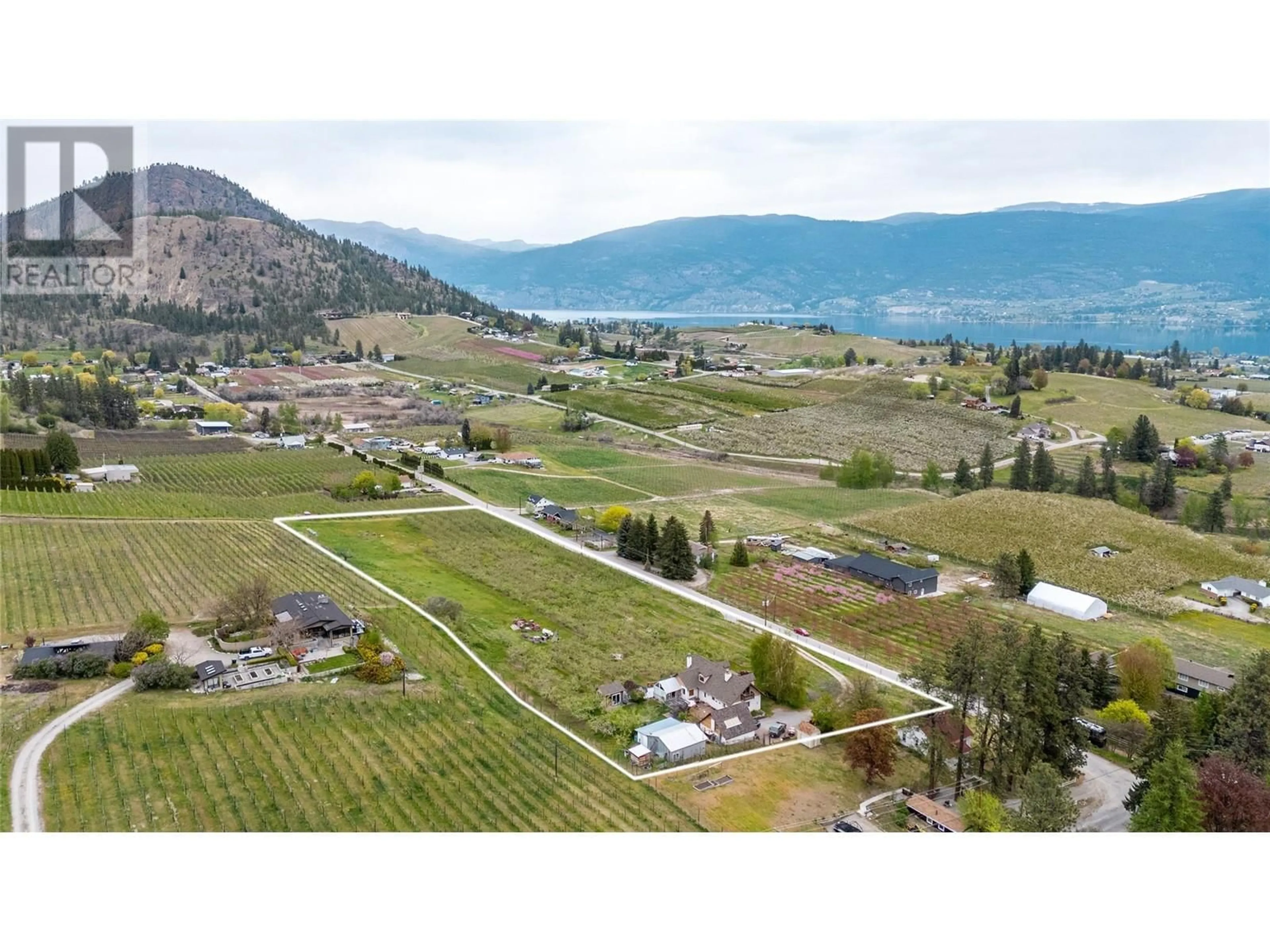 A pic from outside/outdoor area/front of a property/back of a property/a pic from drone, mountain view for 4206 MONRO AVENUE, Summerland British Columbia V0H1Z2