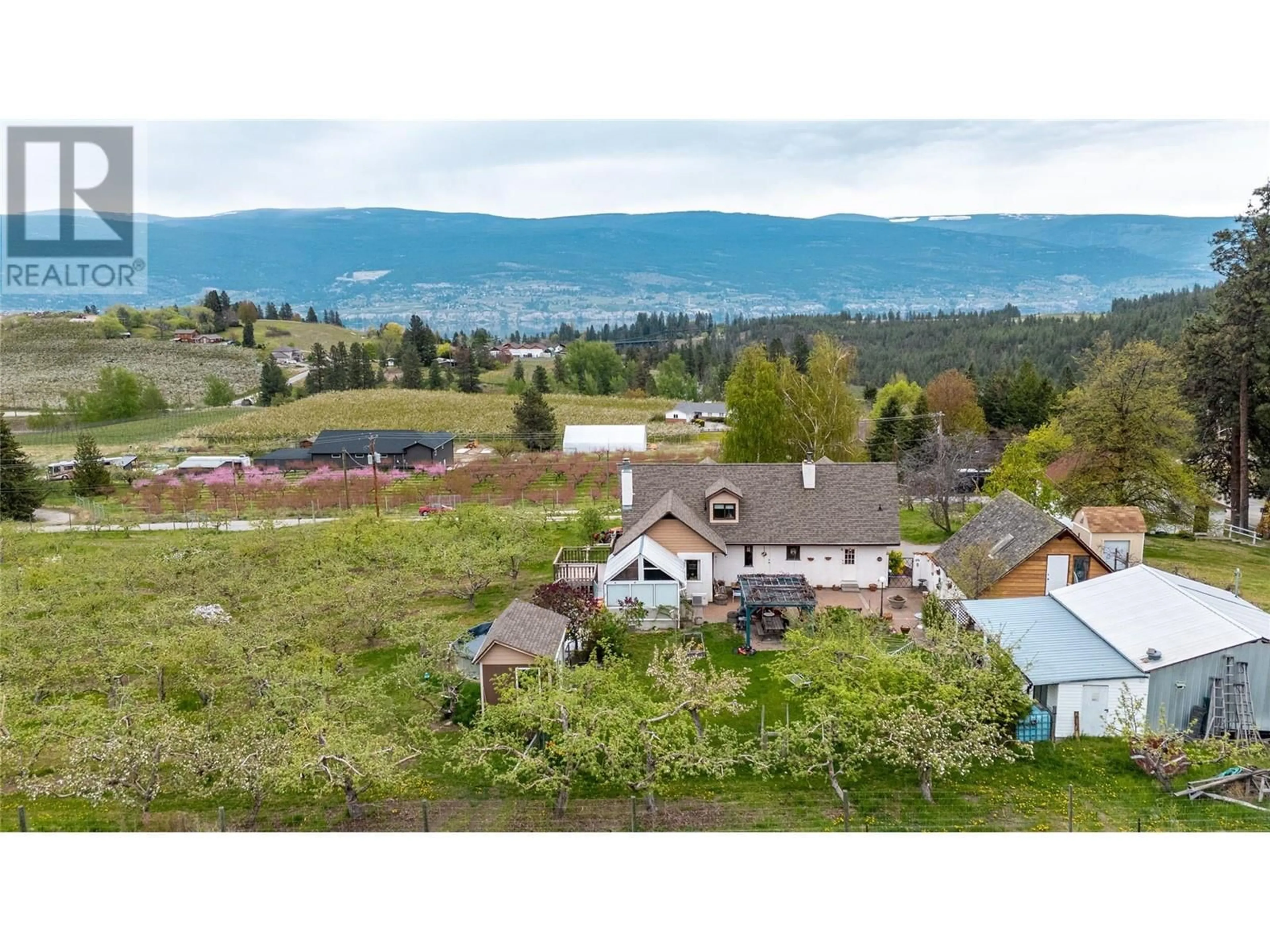 A pic from outside/outdoor area/front of a property/back of a property/a pic from drone, mountain view for 4206 MONRO AVENUE, Summerland British Columbia V0H1Z2