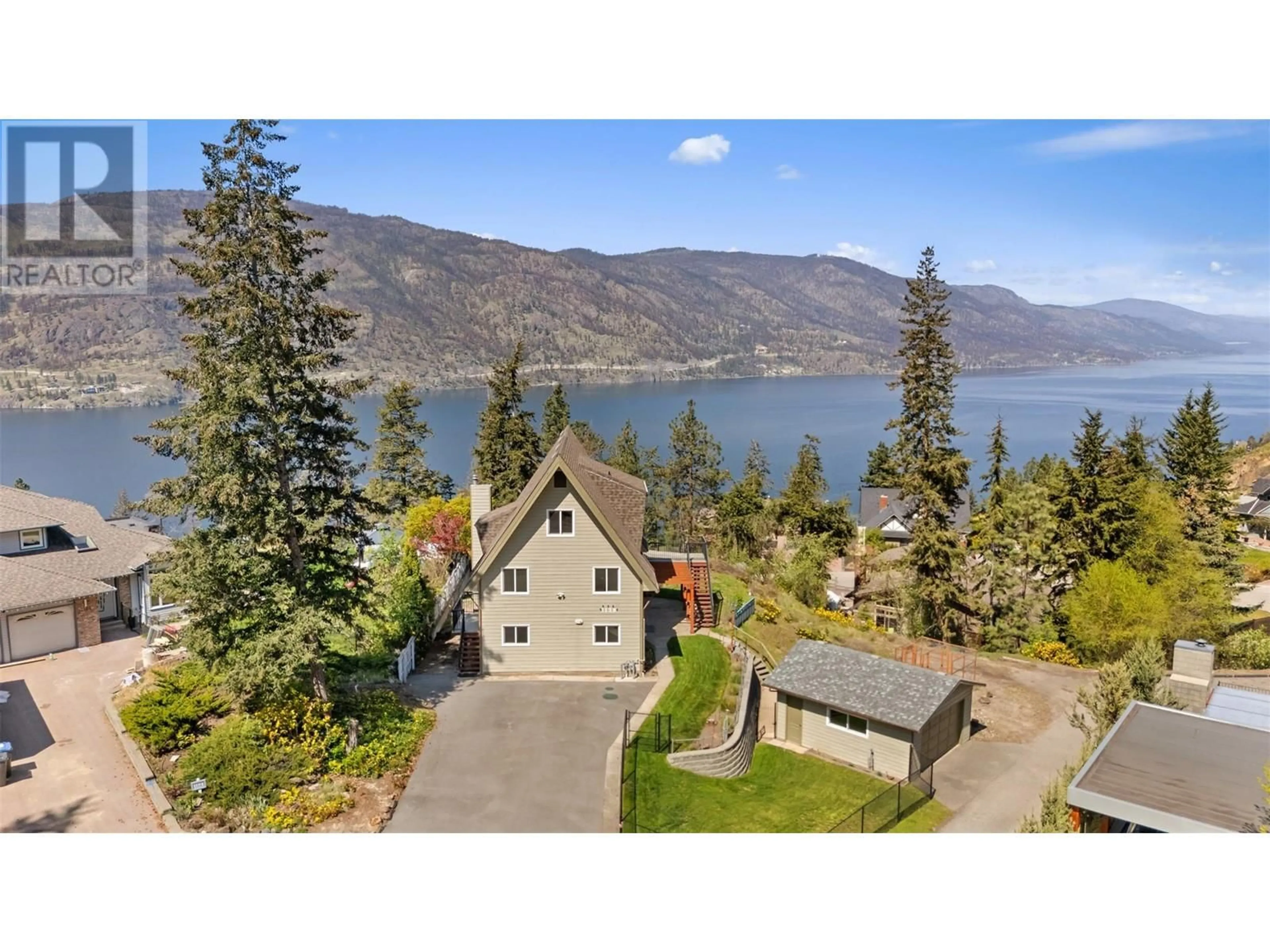 A pic from outside/outdoor area/front of a property/back of a property/a pic from drone, water/lake/river/ocean view for 1128 LYNN COURT, Kelowna British Columbia V1V1H1
