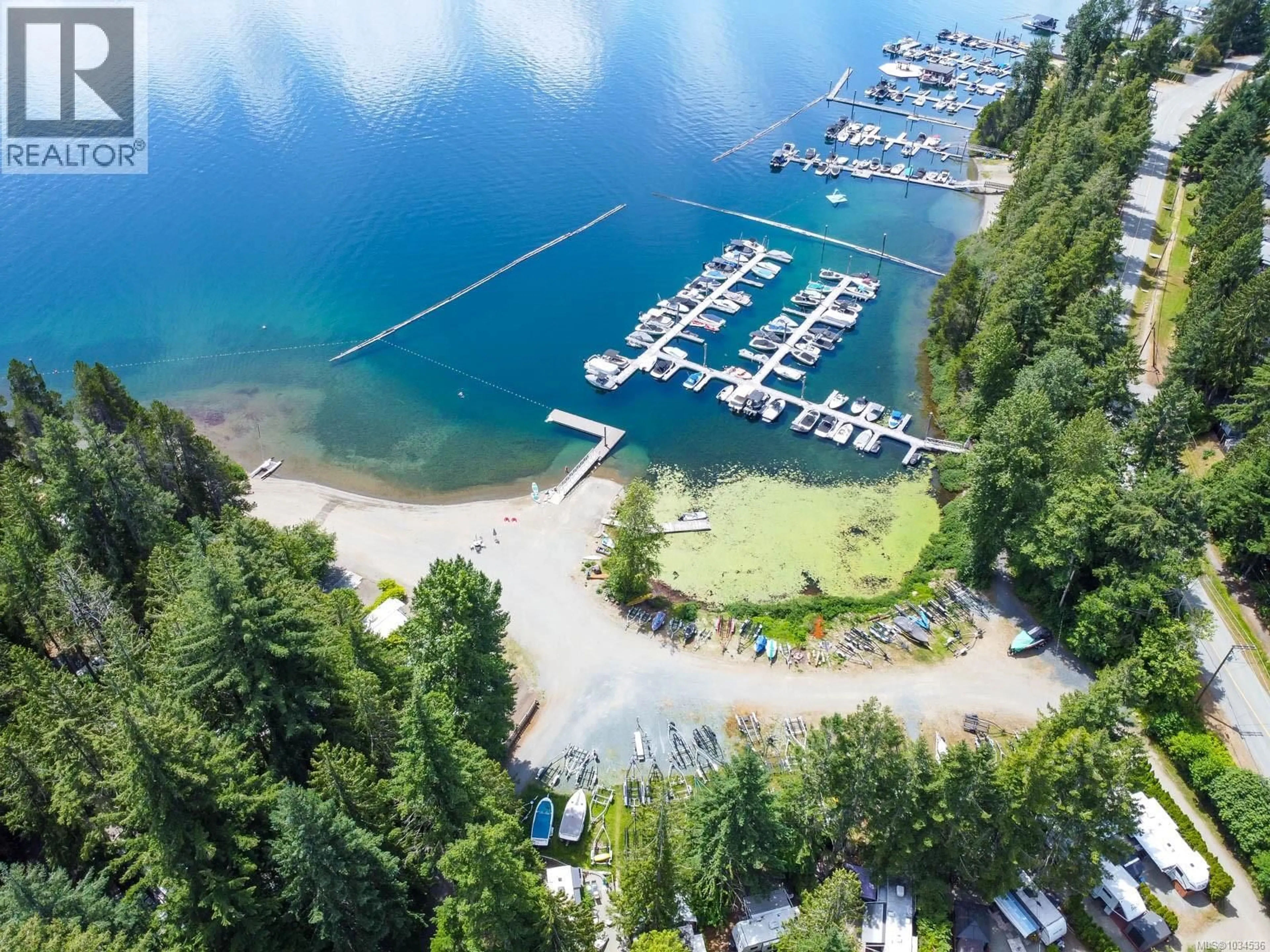 A pic from outside/outdoor area/front of a property/back of a property/a pic from drone, water/lake/river/ocean view for B7 - 10324 LAKESHORE ROAD, Port Alberni British Columbia V9Y8Z6