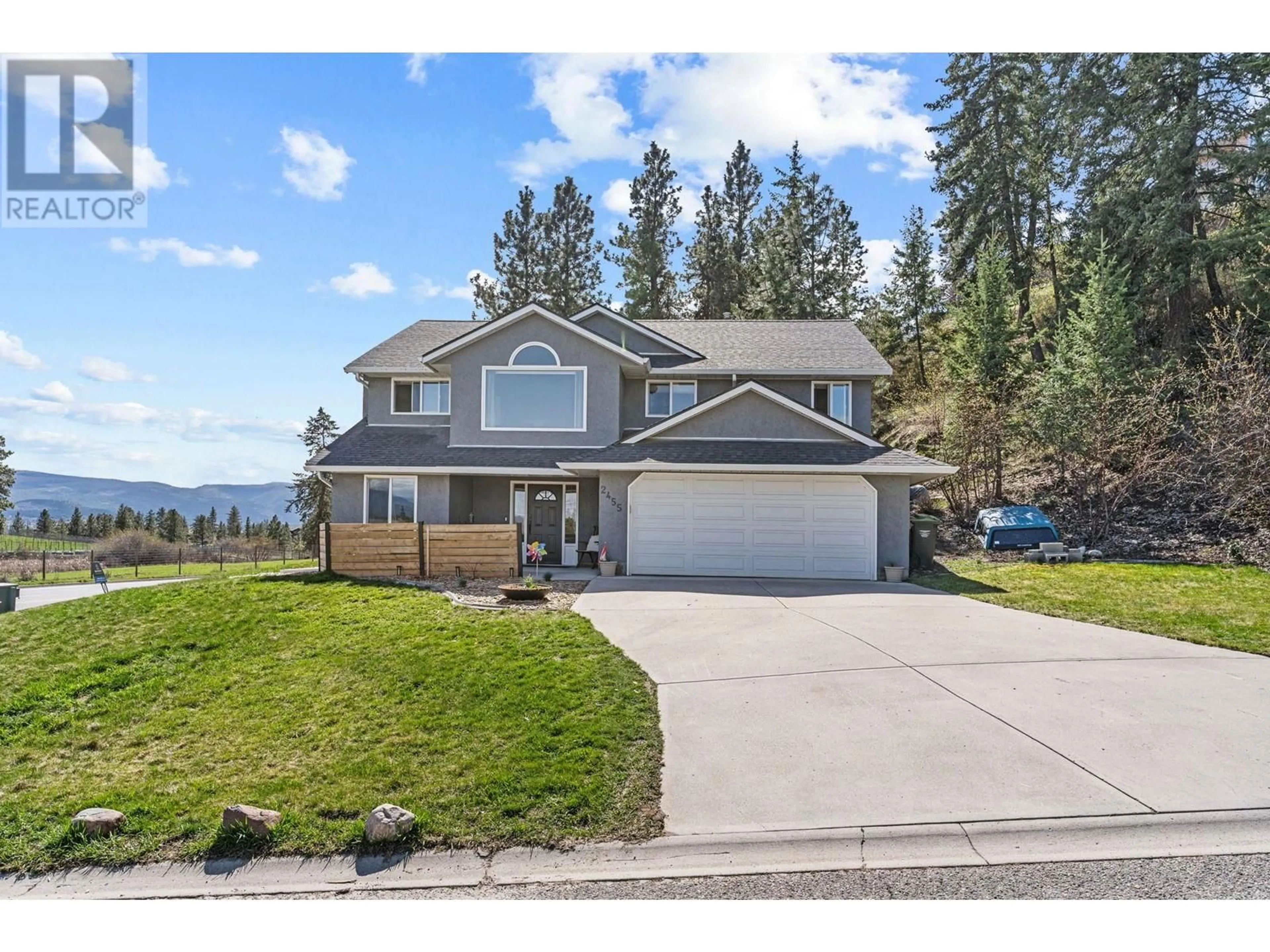 Home with vinyl exterior material, mountain view for 2455 SILVER PLACE, Kelowna British Columbia V1V1M9