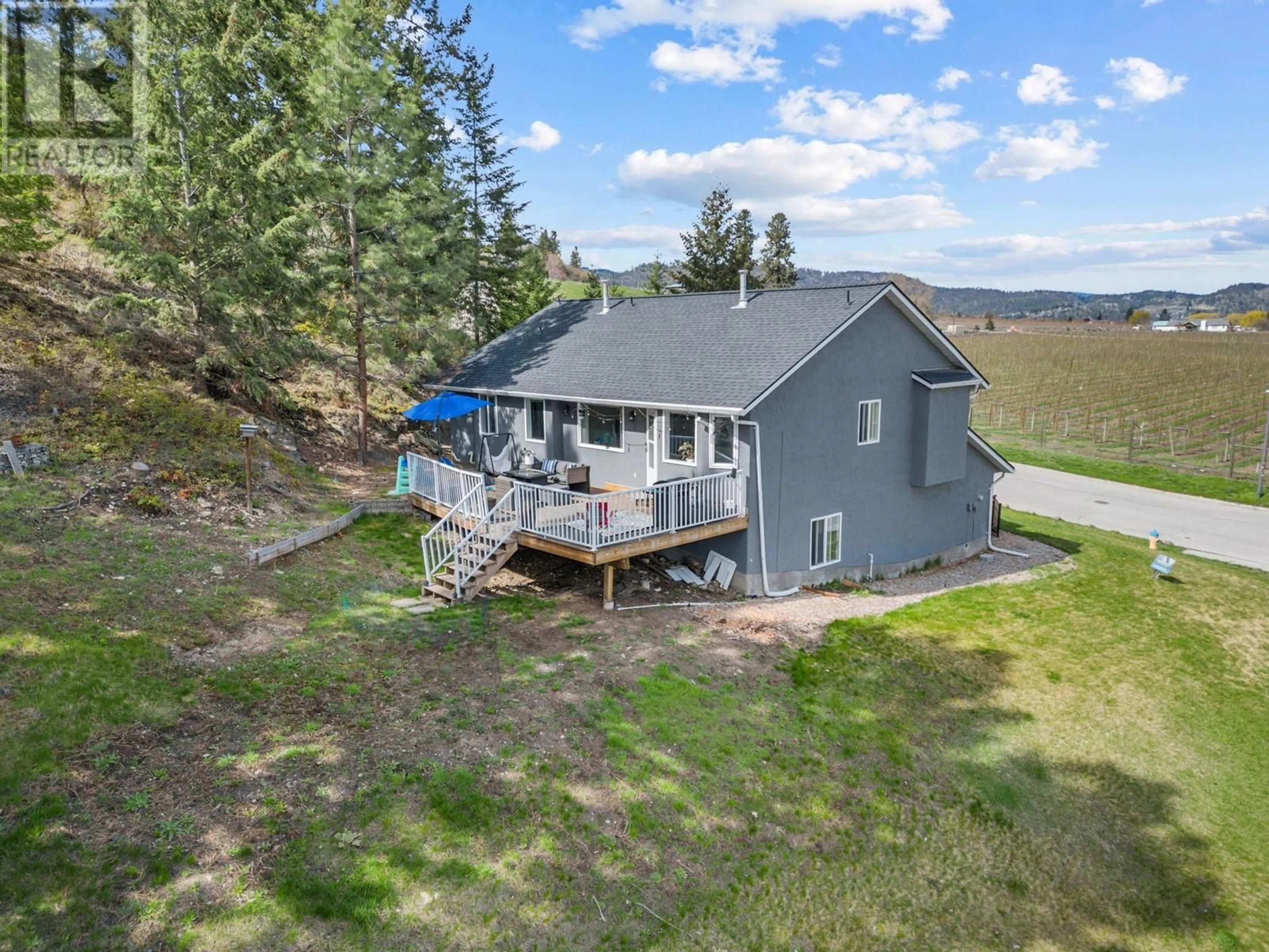 A pic from outside/outdoor area/front of a property/back of a property/a pic from drone, water/lake/river/ocean view for 2455 SILVER PLACE, Kelowna British Columbia V1V1M9