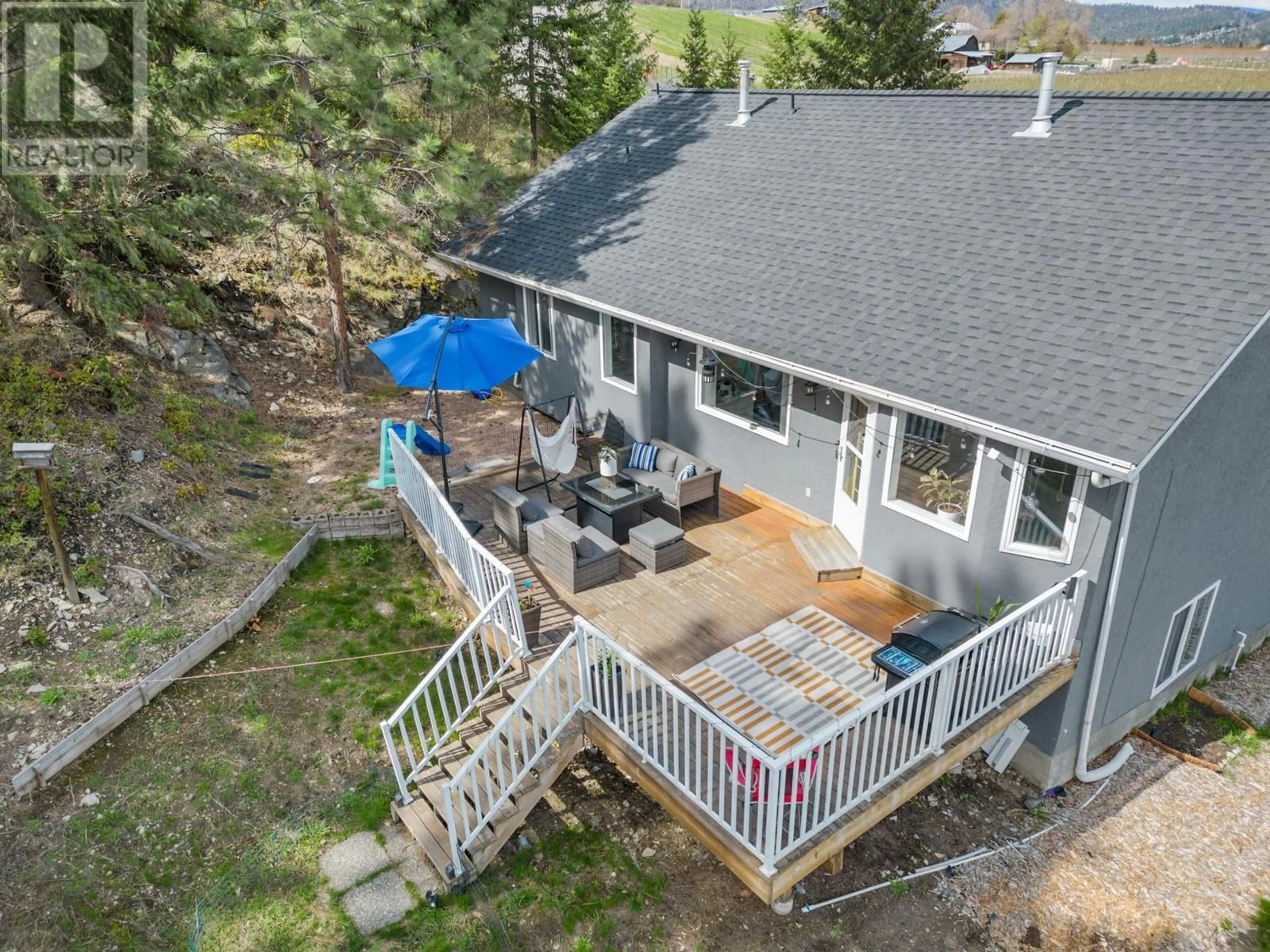 A pic from outside/outdoor area/front of a property/back of a property/a pic from drone, water/lake/river/ocean view for 2455 SILVER PLACE, Kelowna British Columbia V1V1M9