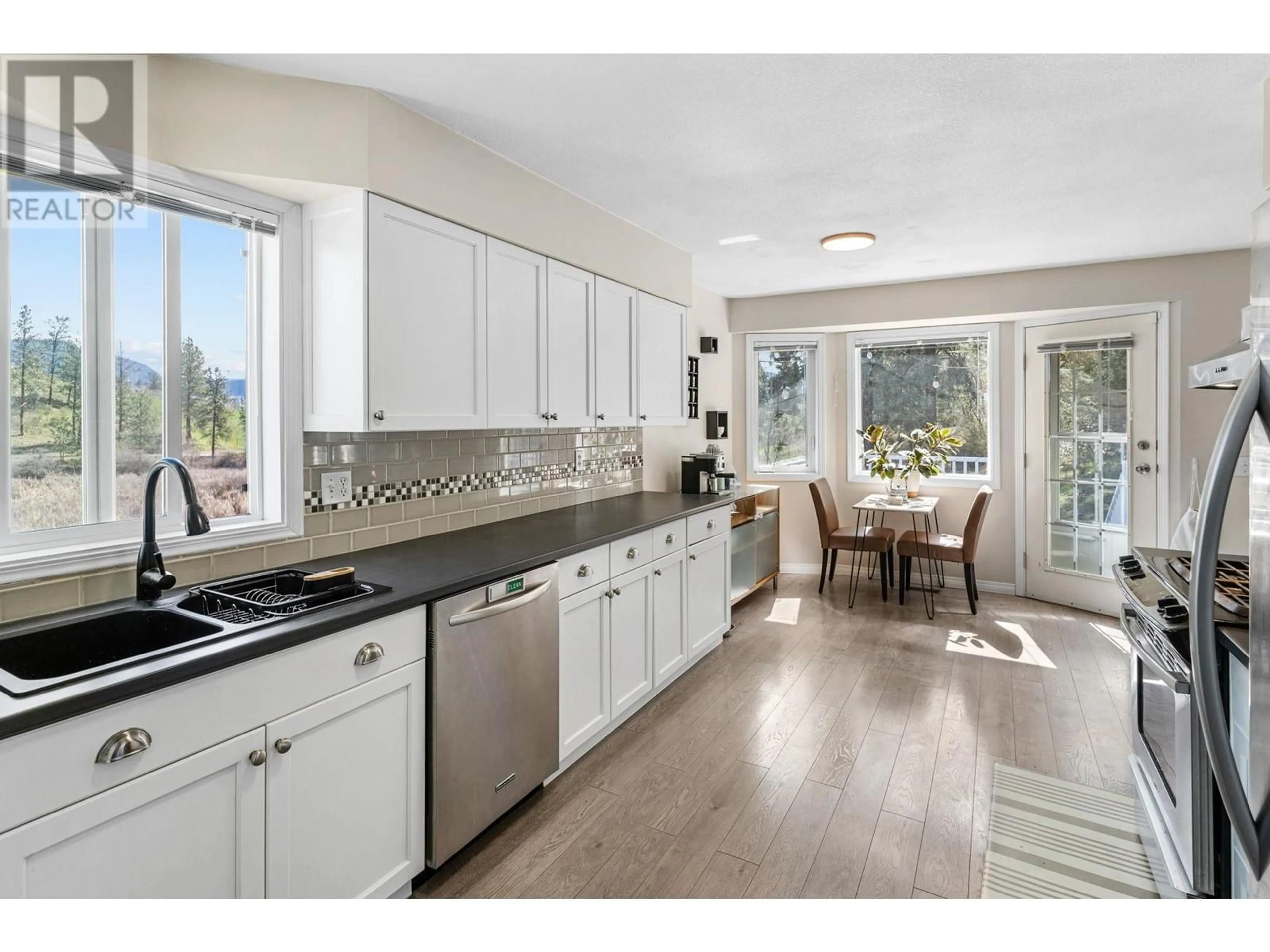 Open concept kitchen, ceramic/tile floor for 2455 SILVER PLACE, Kelowna British Columbia V1V1M9