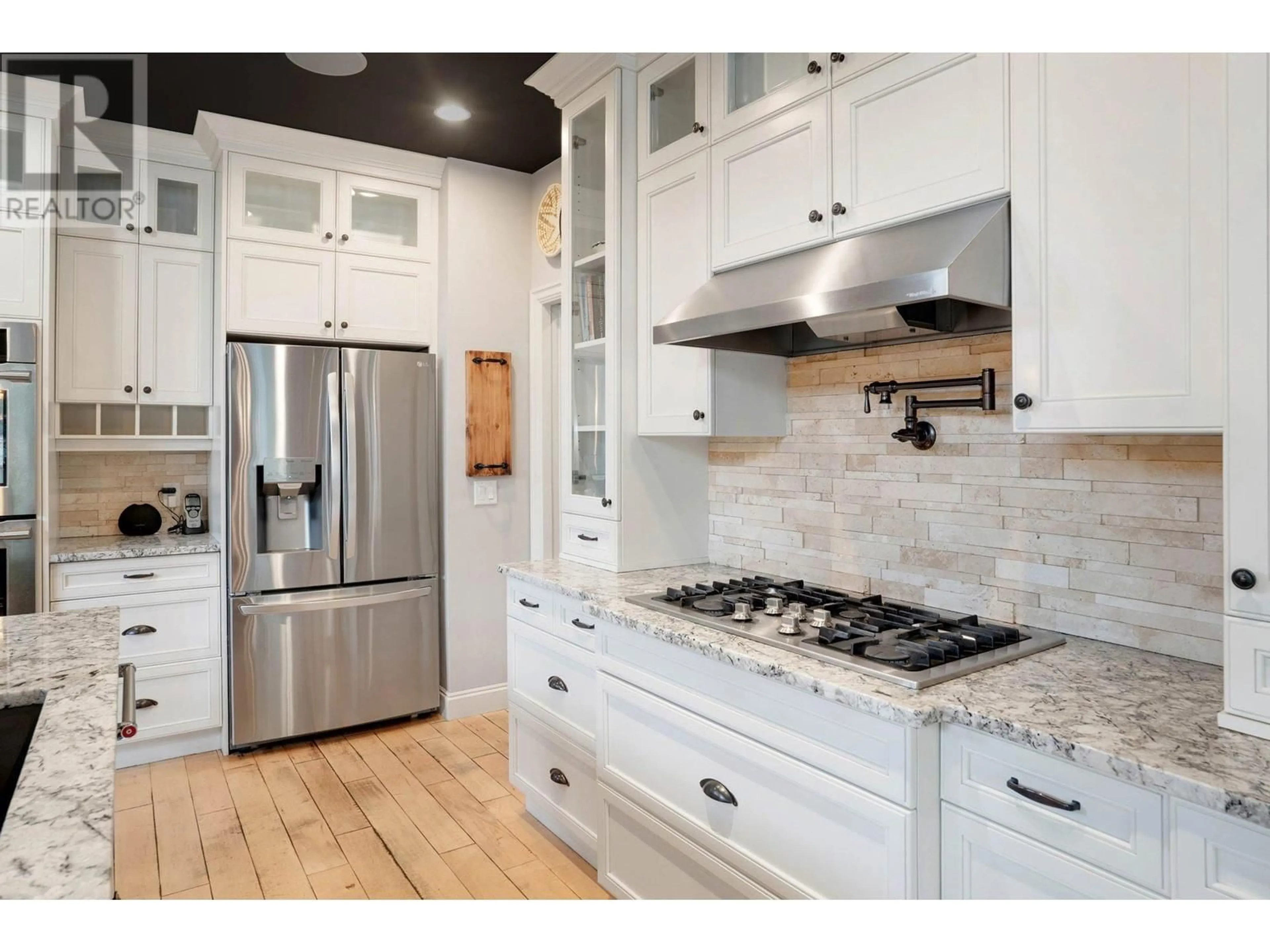 Contemporary kitchen, ceramic/tile floor for 1982 HIDDEN RIDGE PLACE, Kelowna British Columbia V1V2X8