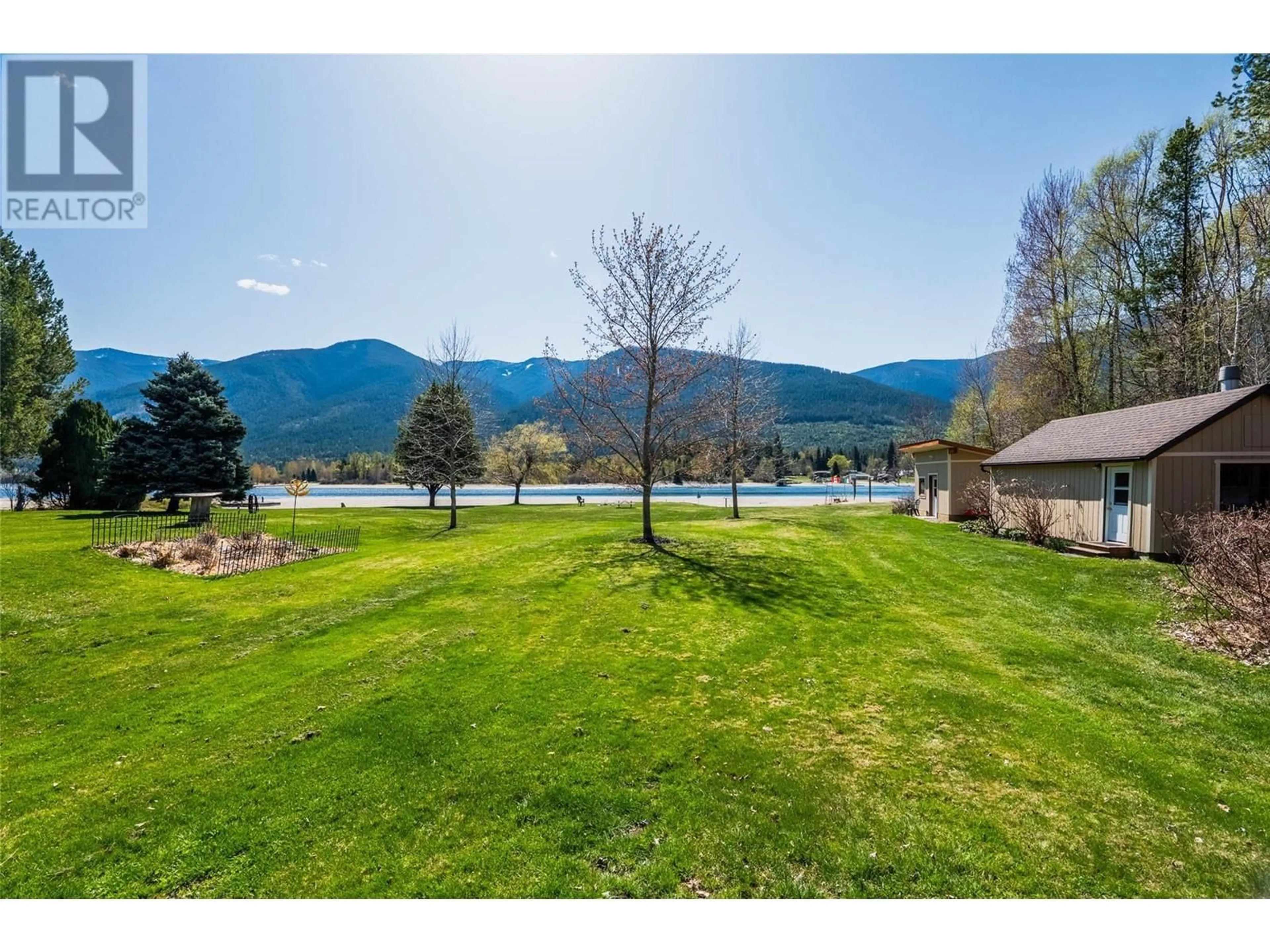 A pic from outside/outdoor area/front of a property/back of a property/a pic from drone, water/lake/river/ocean view for 6158 REDFISH ROAD, Nelson British Columbia V1L6M9