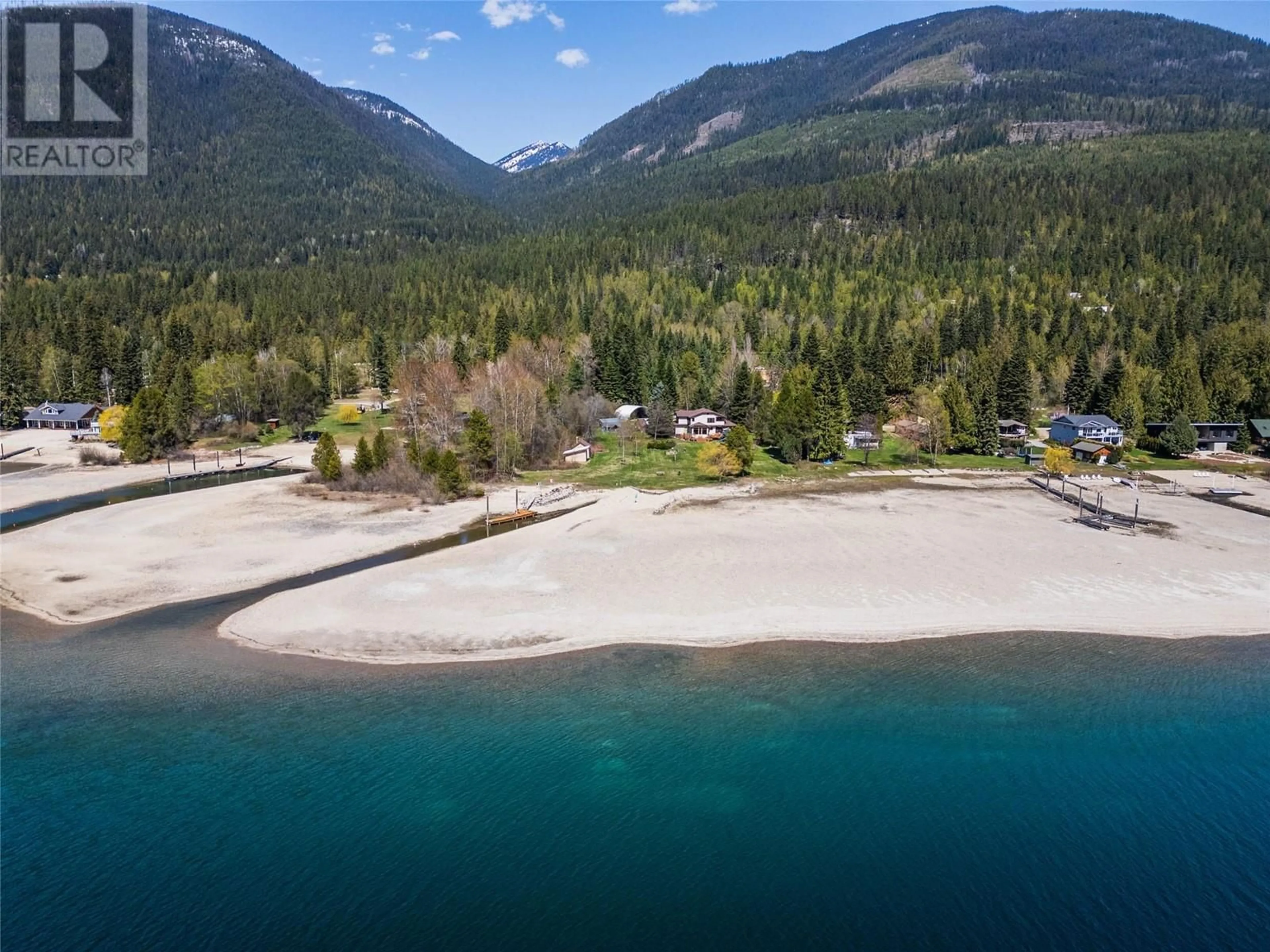 A pic from outside/outdoor area/front of a property/back of a property/a pic from drone, water/lake/river/ocean view for 6158 REDFISH ROAD, Nelson British Columbia V1L6M9