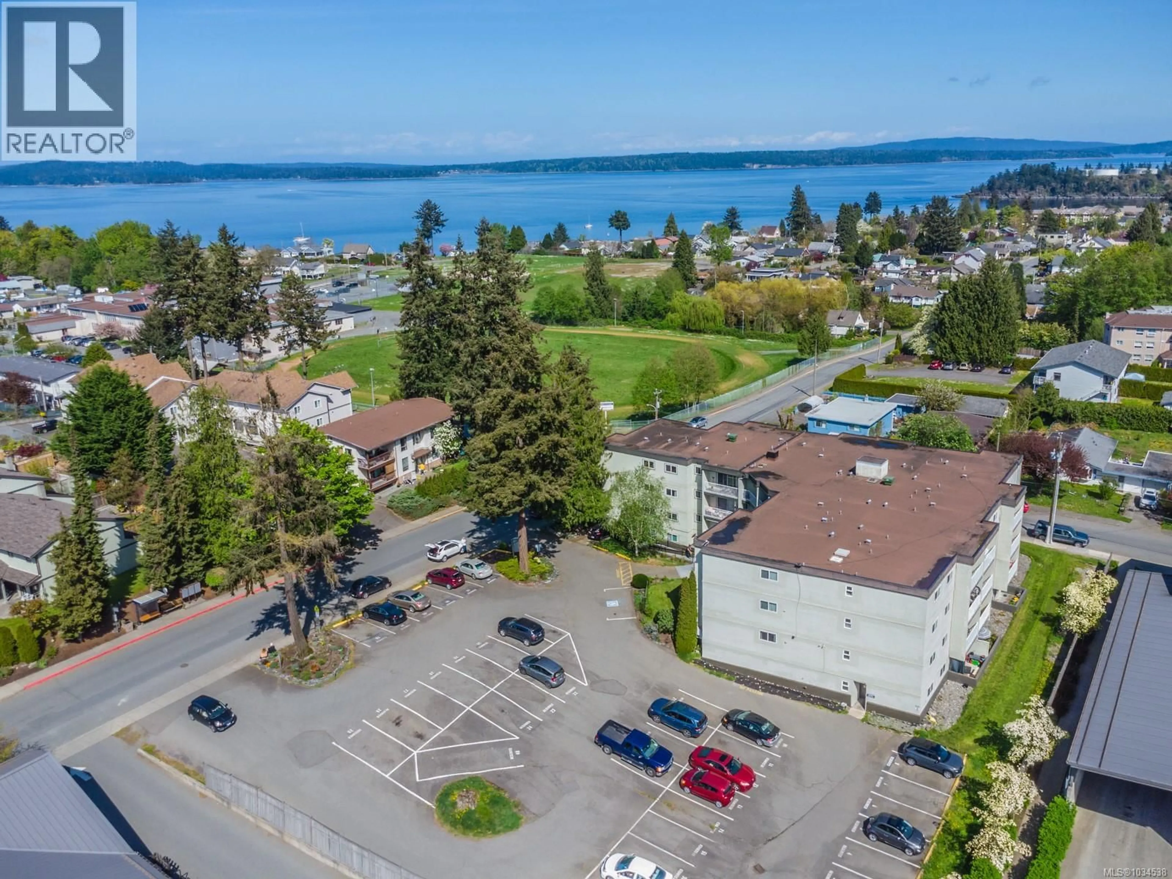 A pic from outside/outdoor area/front of a property/back of a property/a pic from drone, water/lake/river/ocean view for 103 - 3040 PINE STREET, Chemainus British Columbia V0R1K0