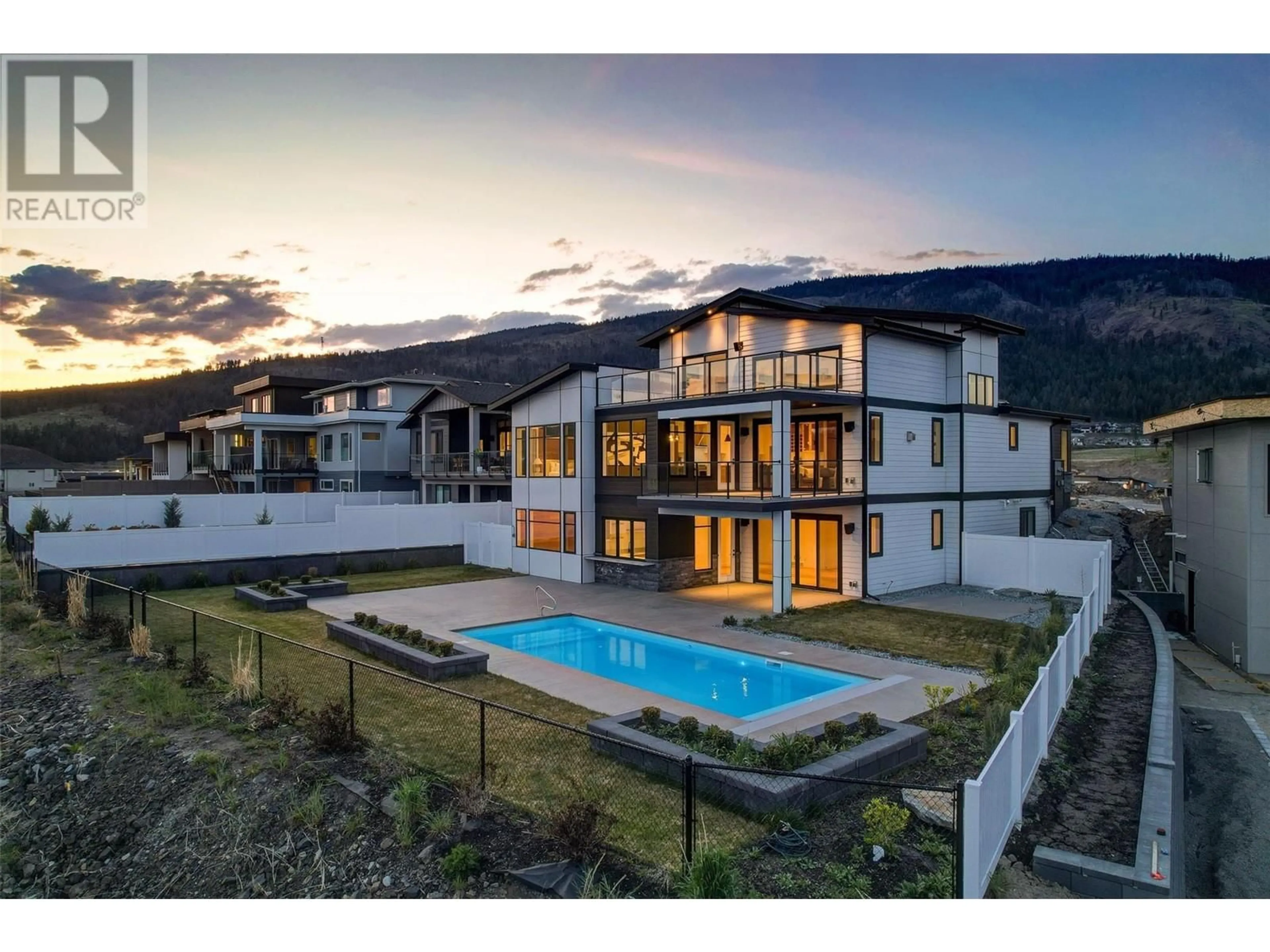A pic from outside/outdoor area/front of a property/back of a property/a pic from drone, mountain view for 2507 PINNACLE RIDGE DRIVE, West Kelowna British Columbia V4T0E3