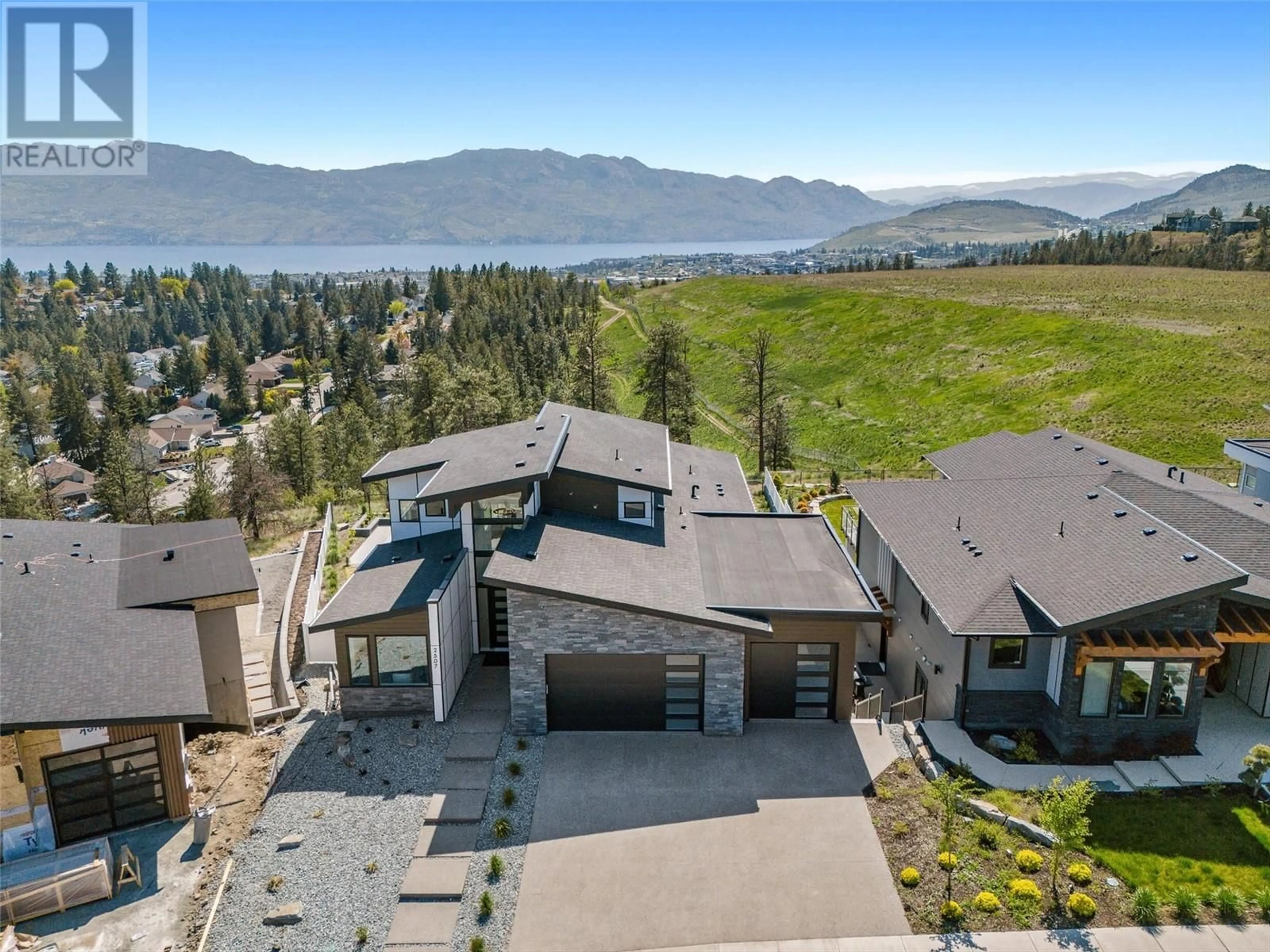 A pic from outside/outdoor area/front of a property/back of a property/a pic from drone, mountain view for 2507 PINNACLE RIDGE DRIVE, West Kelowna British Columbia V4T0E3