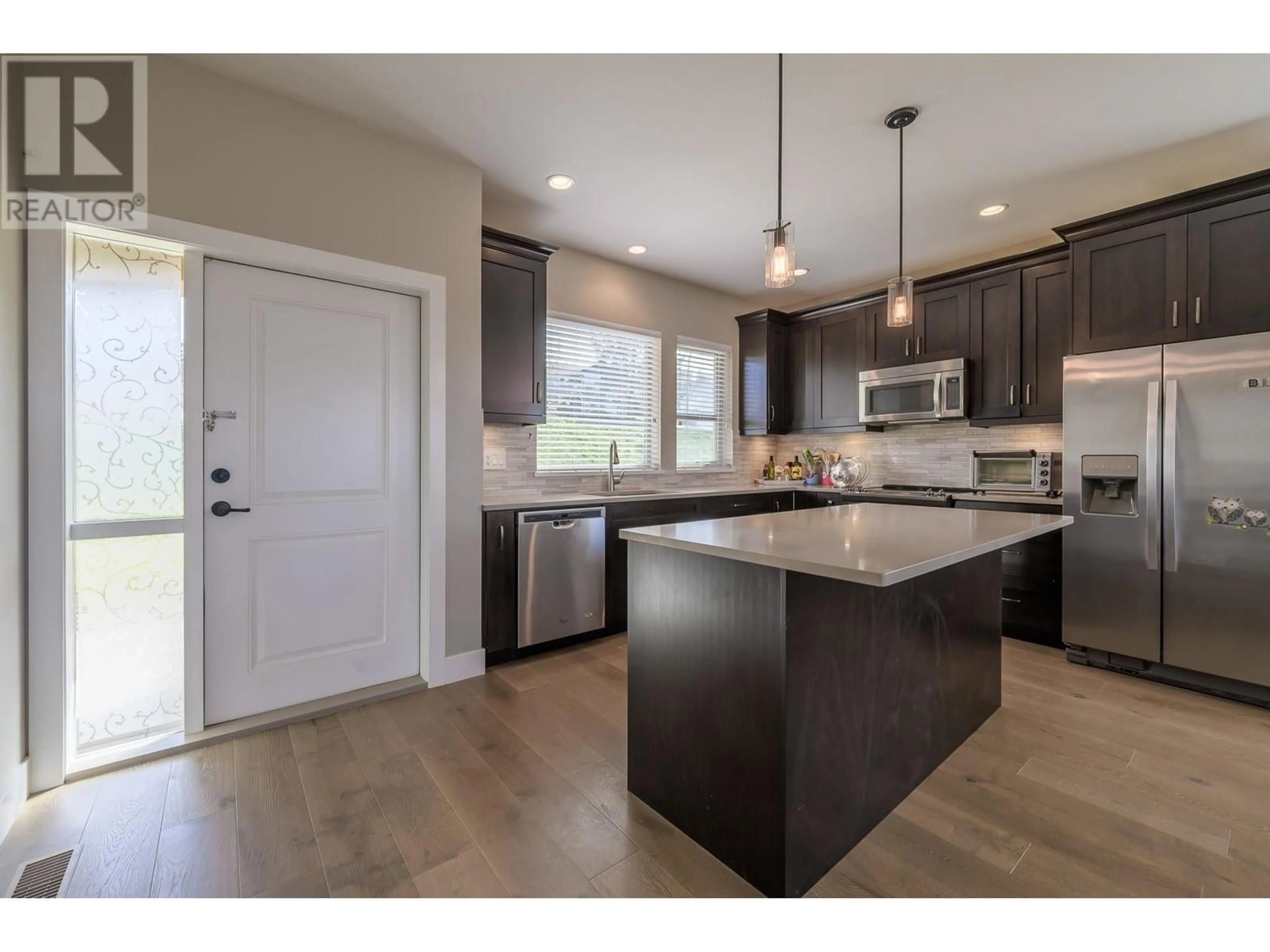 Open concept kitchen, wood/laminate floor for 9 - 2171 VAN HORNE DRIVE, Kamloops British Columbia V1S0E2