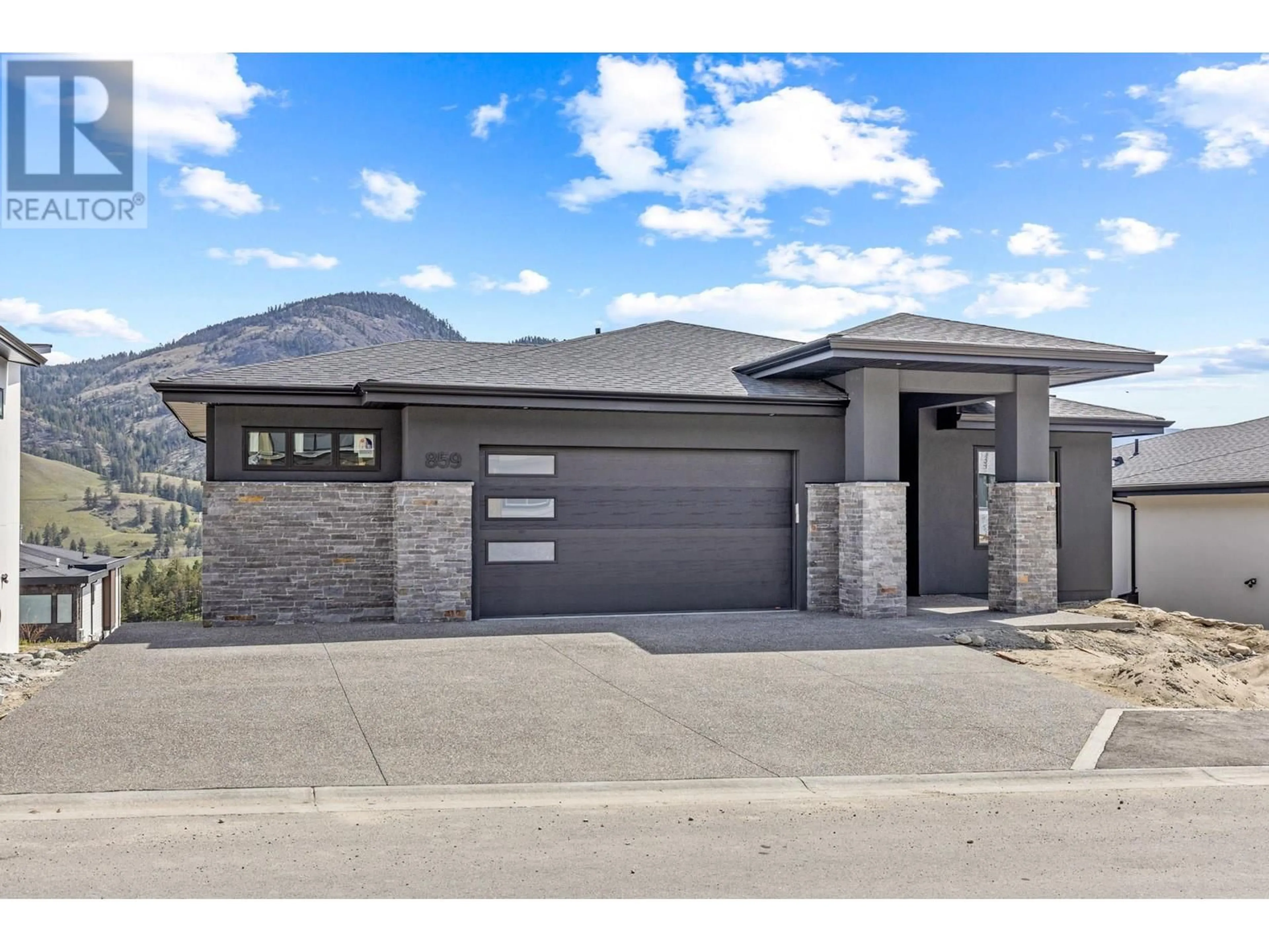 Home with brick exterior material, street for 859 MELROSE STREET, Kelowna British Columbia V1P0A8
