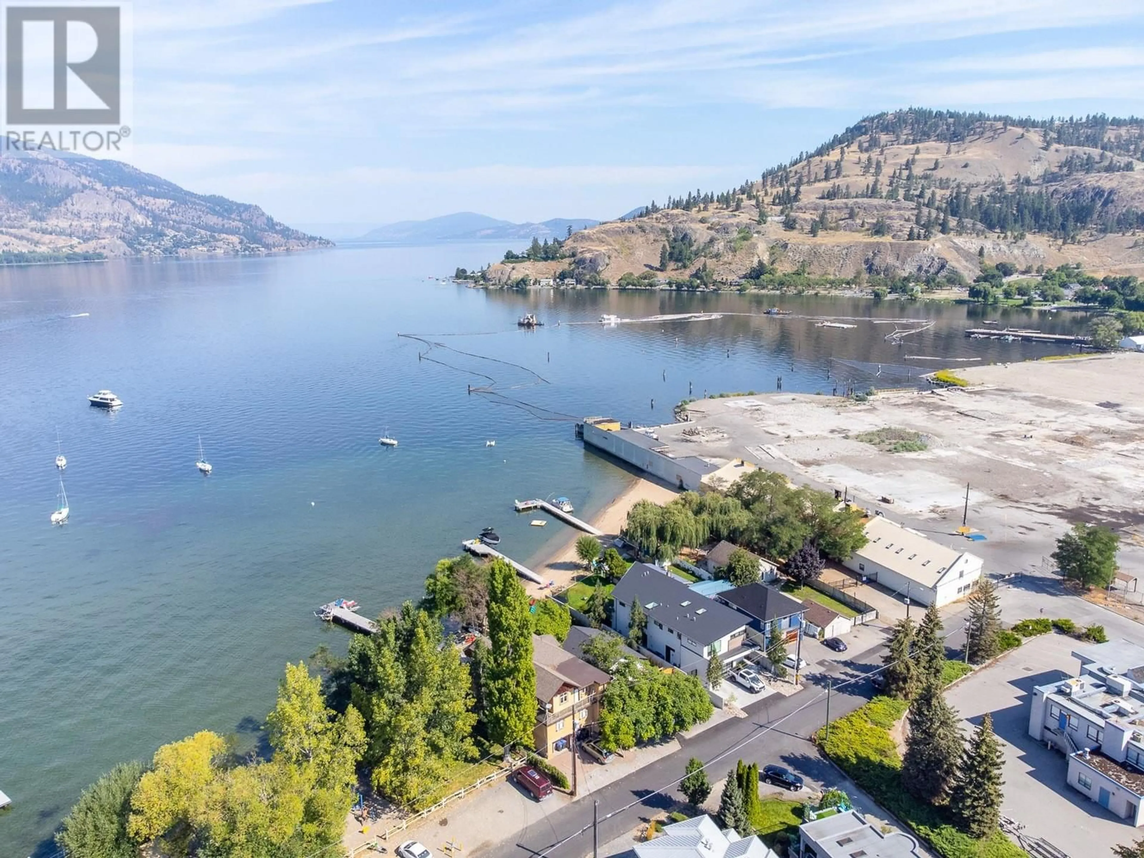 A pic from outside/outdoor area/front of a property/back of a property/a pic from drone, water/lake/river/ocean view for 832 MANHATTAN DRIVE, Kelowna British Columbia V1Y1H5