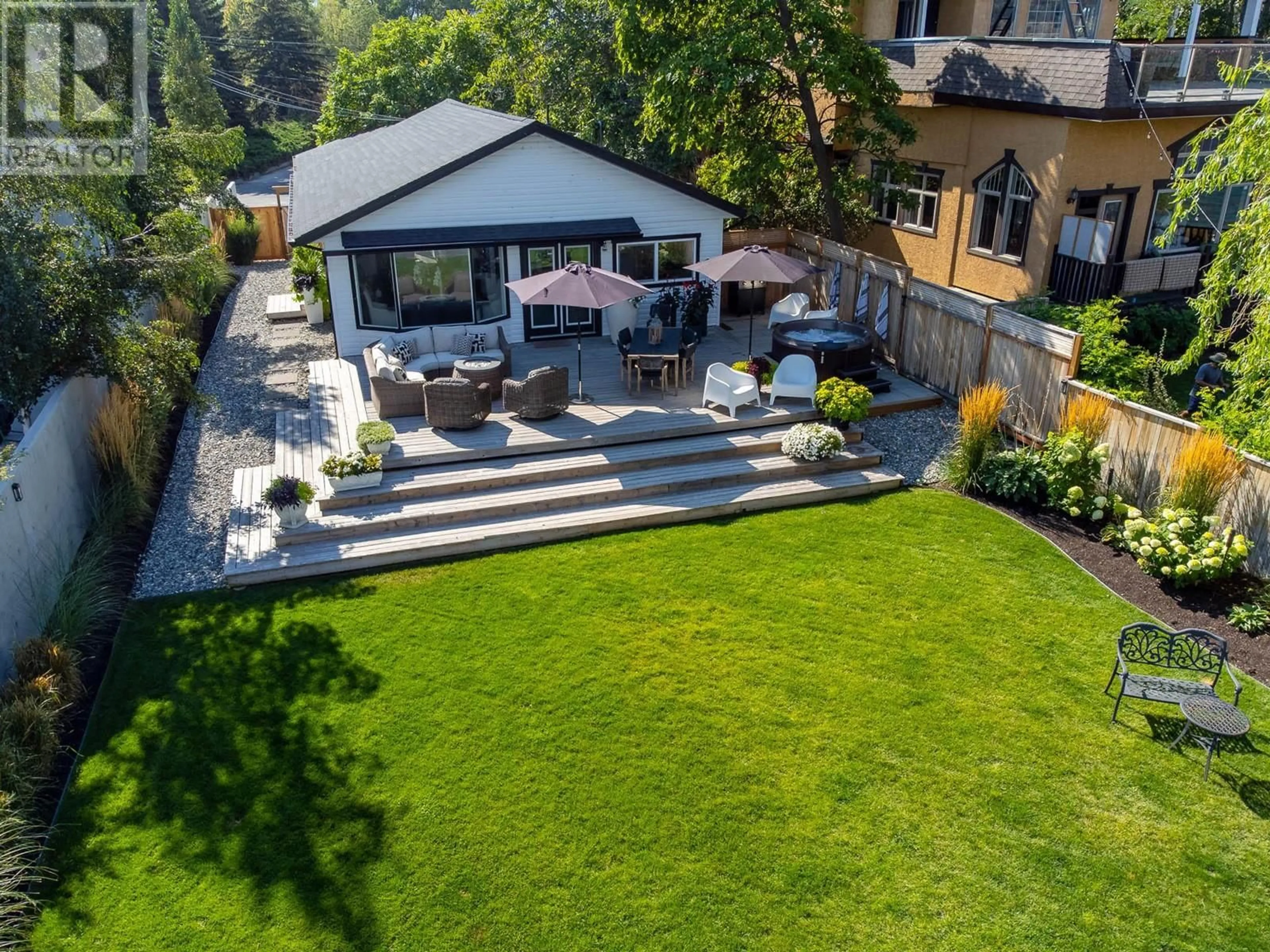 A pic from outside/outdoor area/front of a property/back of a property/a pic from drone, mountain view for 832 MANHATTAN DRIVE, Kelowna British Columbia V1Y1H5