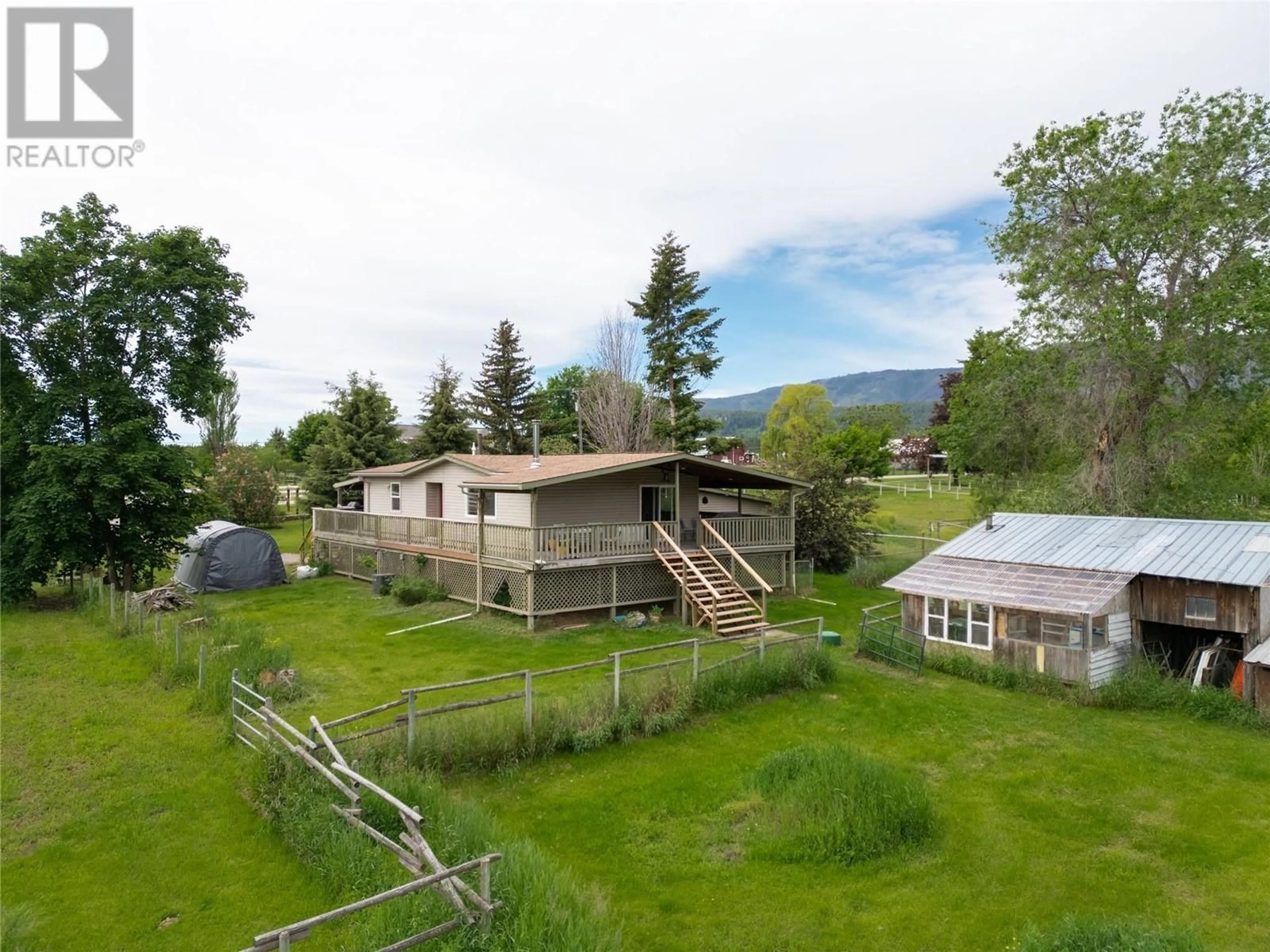A pic from outside/outdoor area/front of a property/back of a property/a pic from drone, mountain view for 4816 SOUTH GRANDVIEW FLATS ROAD, Armstrong British Columbia V0E1B5