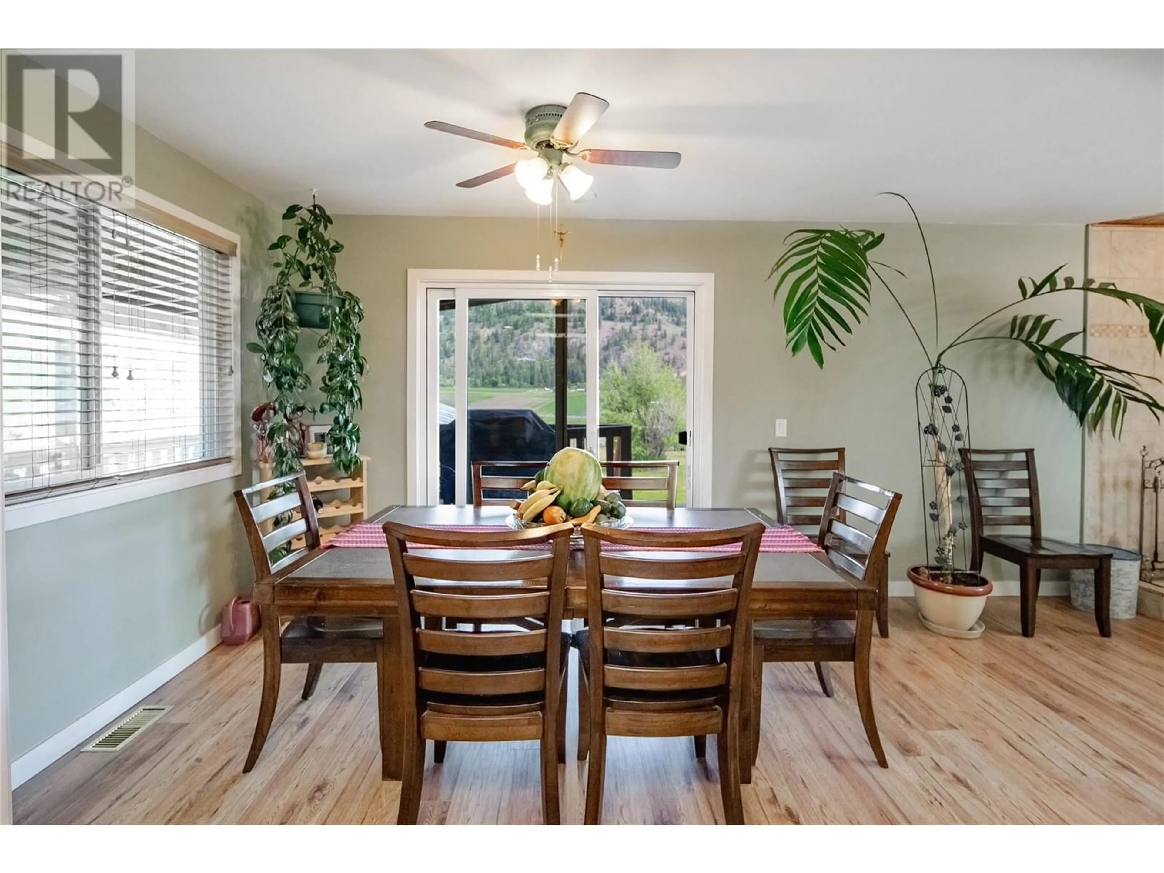Dining room, wood/laminate floor for 4816 SOUTH GRANDVIEW FLATS ROAD, Armstrong British Columbia V0E1B5