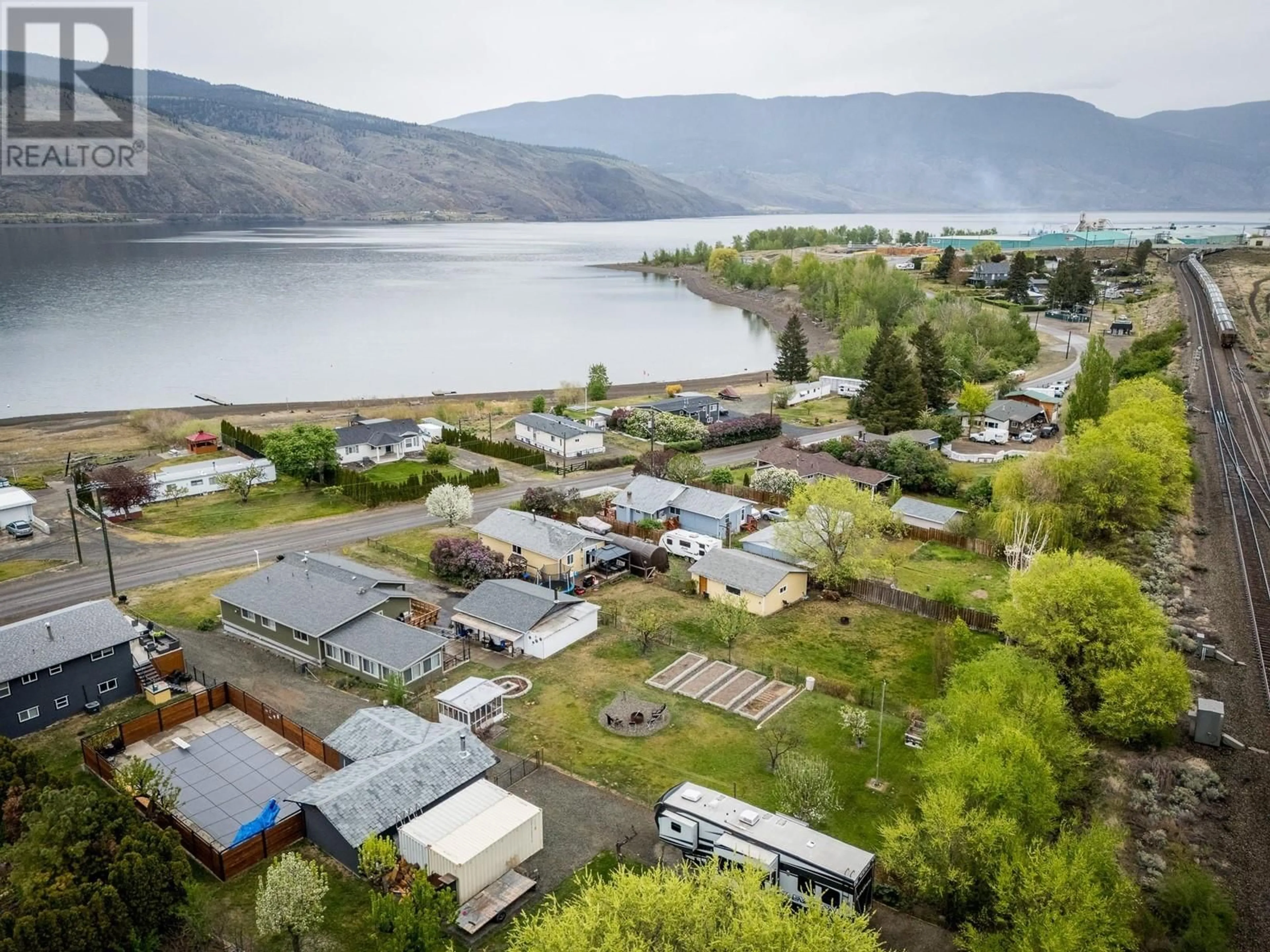 A pic from outside/outdoor area/front of a property/back of a property/a pic from drone, water/lake/river/ocean view for 7040 SAVONA ACCESS RD ROAD, Kamloops British Columbia V0K2J0
